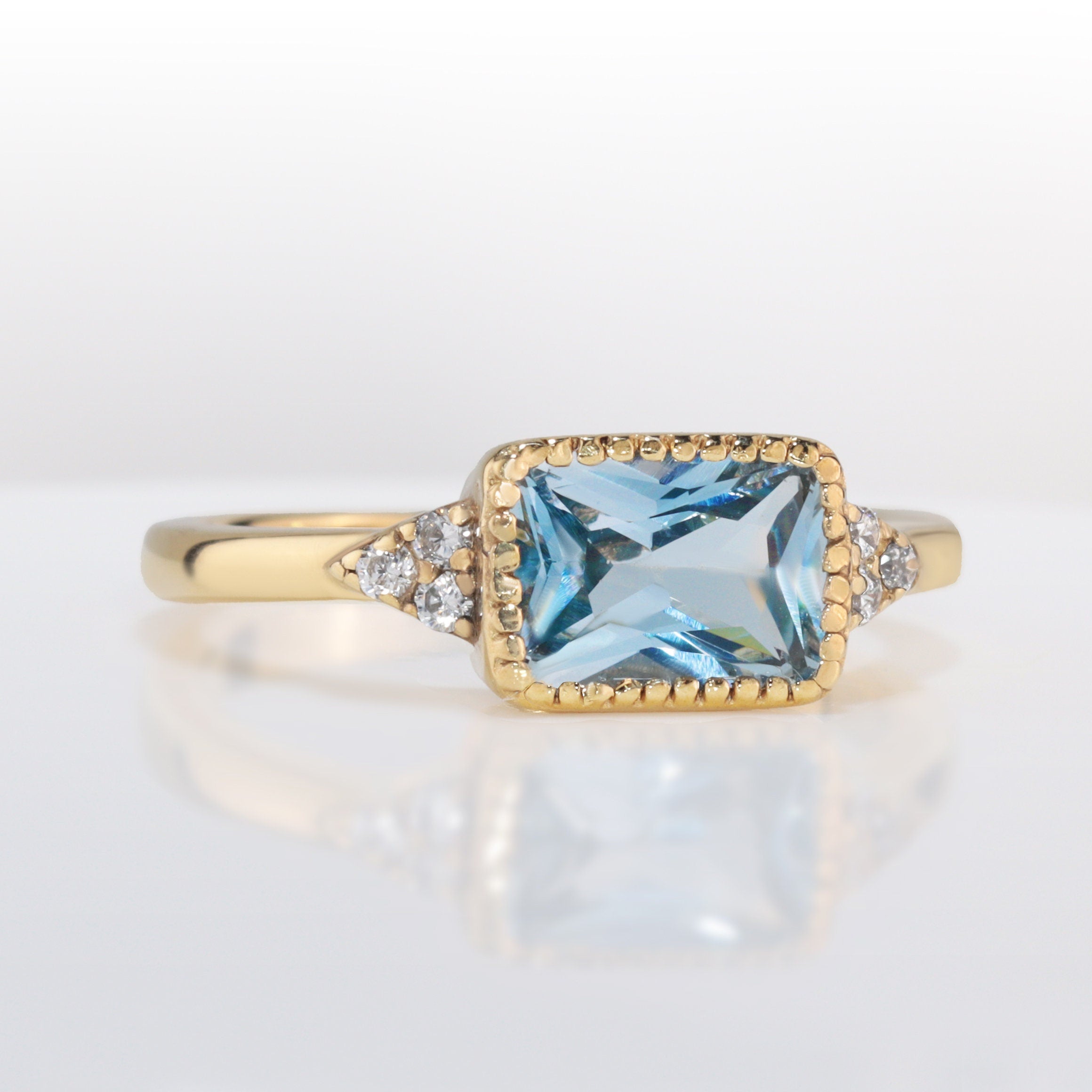 East-West Octagon Blue Topaz Ring with Clear Quartz Accents - H.L.Jewelry