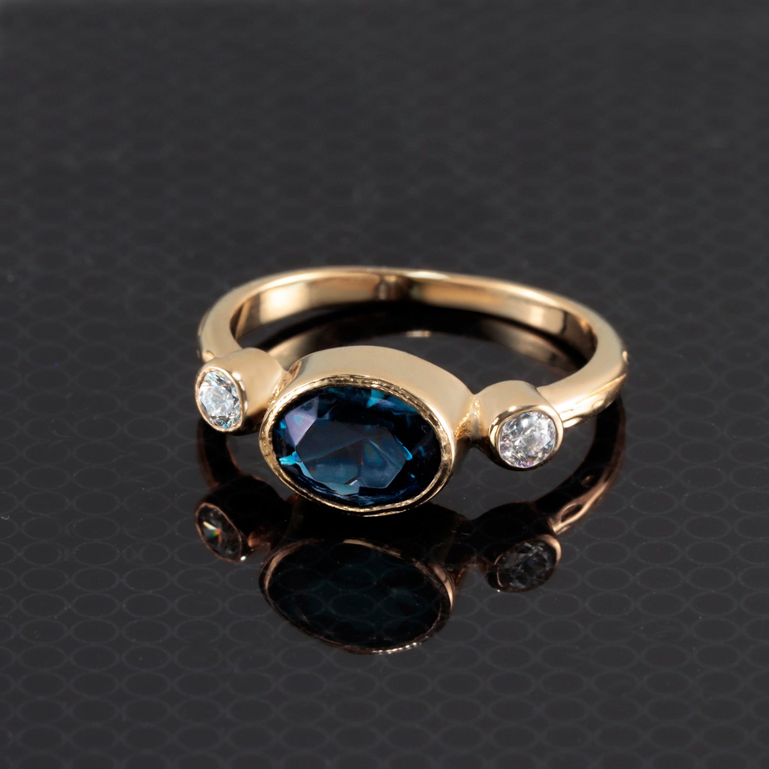 East-West Oval Blue Sapphire Bezel Ring with Clear Quartz Accents - H.L.Jewelry