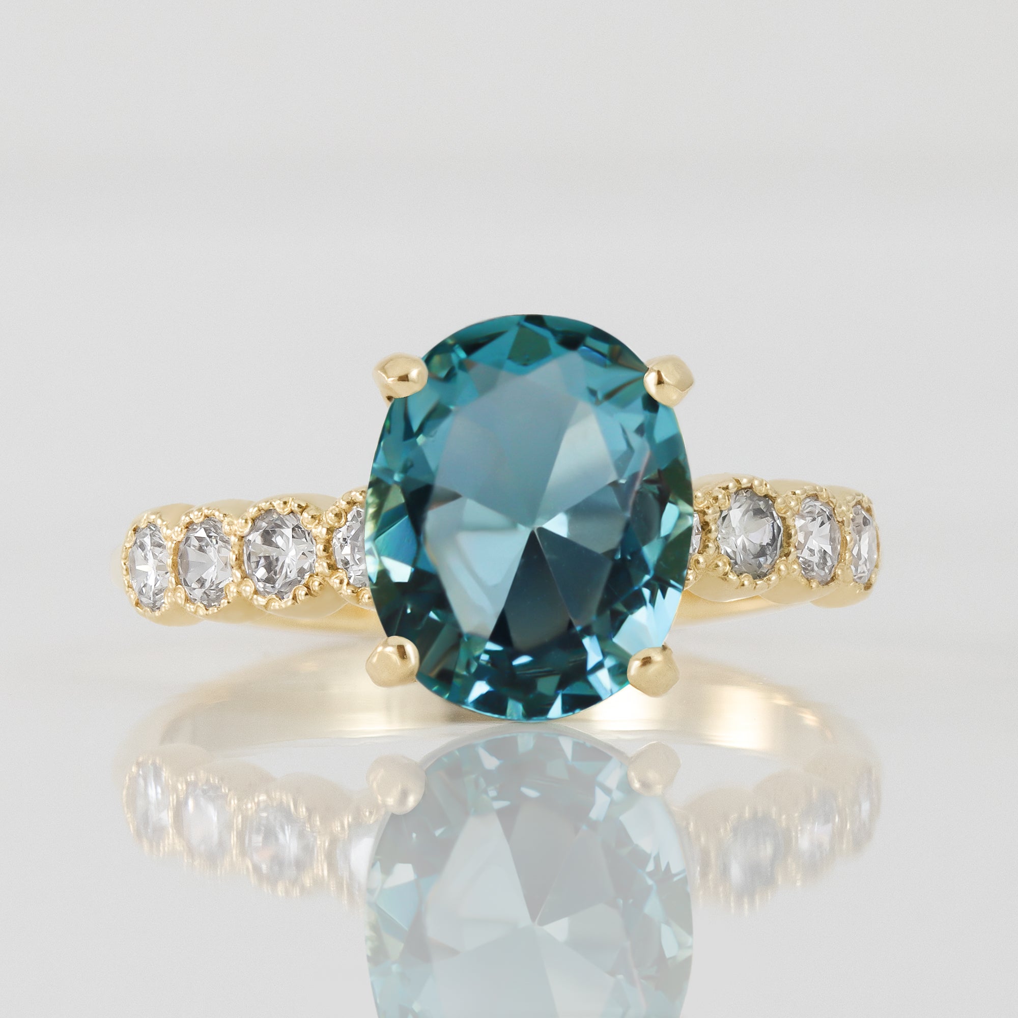 Oval Blue Topaz Engagement Ring with Clear Quartz Accents - H.L.Jewelry