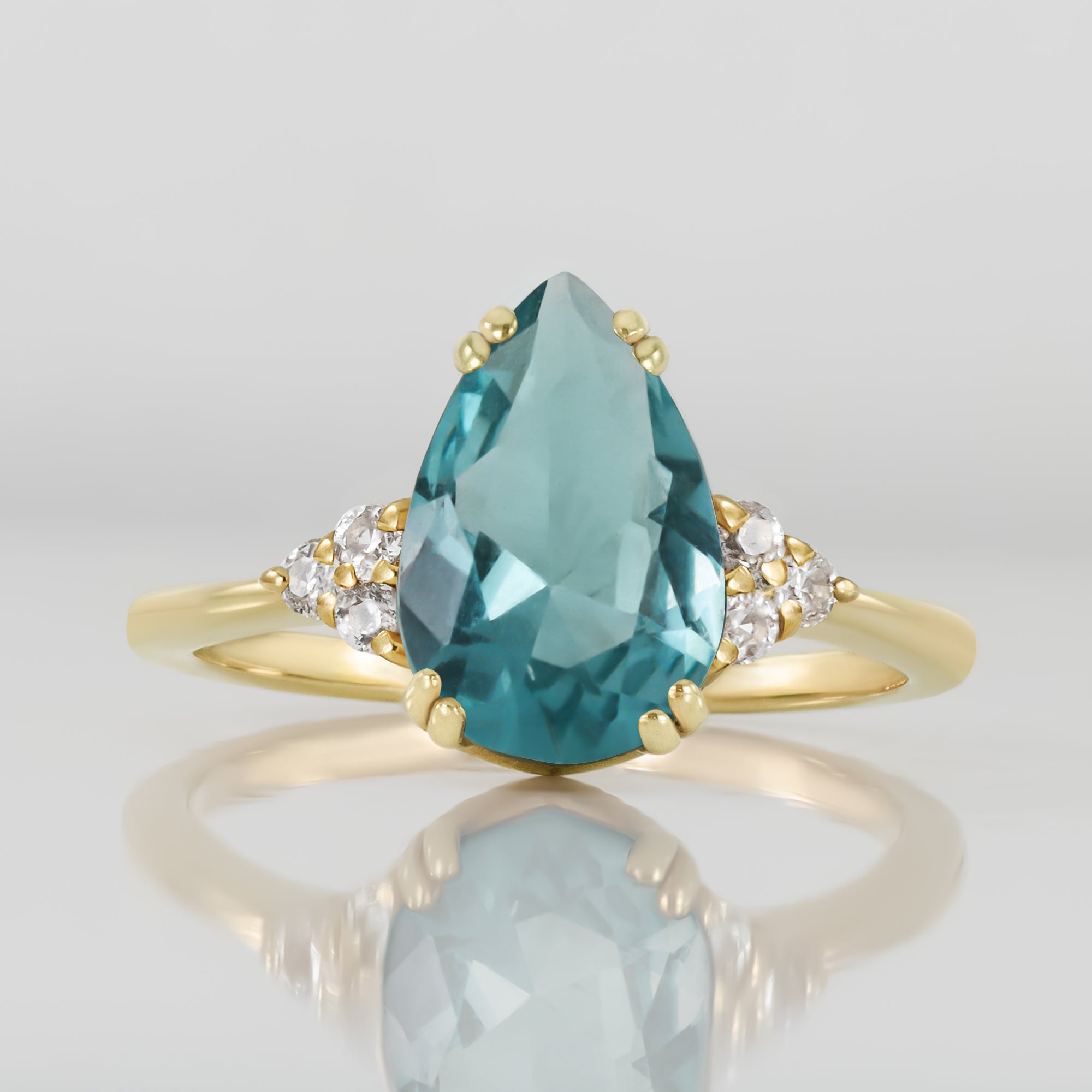 Pear-Shaped Blue Topaz Engagement Ring with Clear Quartz Accents - H.L.Jewelry