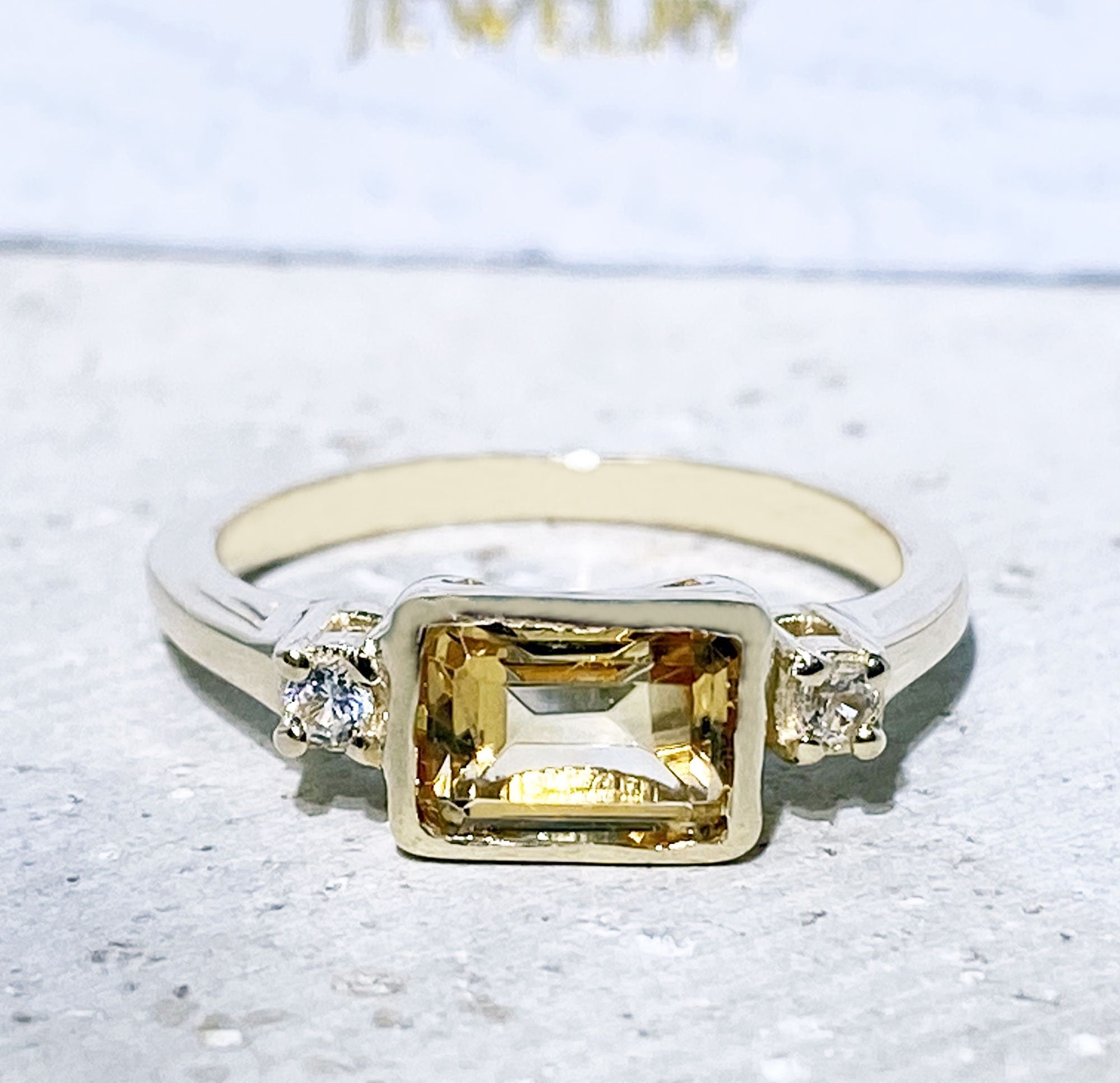 East-West Emerald-Cut Citrine Ring with Clear Quartz Accents - H.L.Jewelry