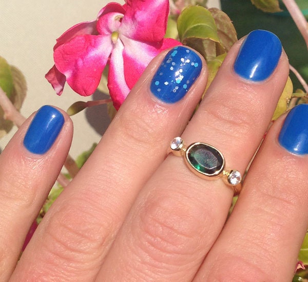 East-West Oval Emerald Bezel Ring with Clear Quartz Accents - H.L.Jewelry