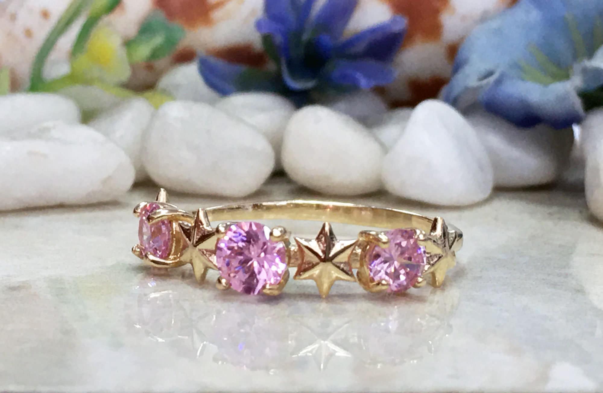 October Birthstone Round Rose Quartz Three-Stone Ring with Star Accents - H.L.Jewelry