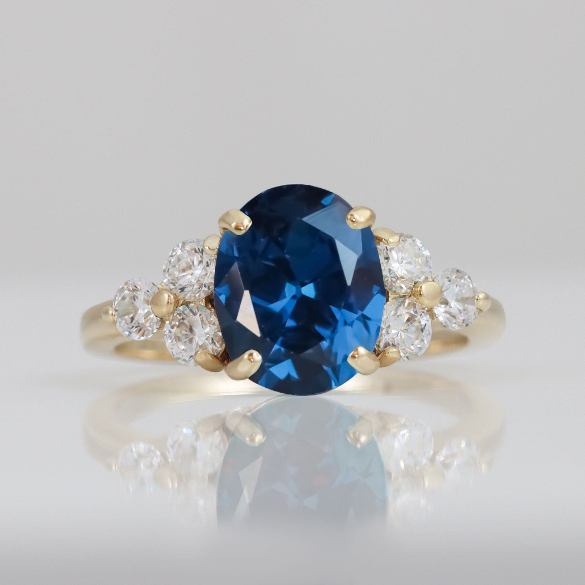Oval Blue Sapphire Engagement Ring with Clear Quartz Accents - H.L.Jewelry