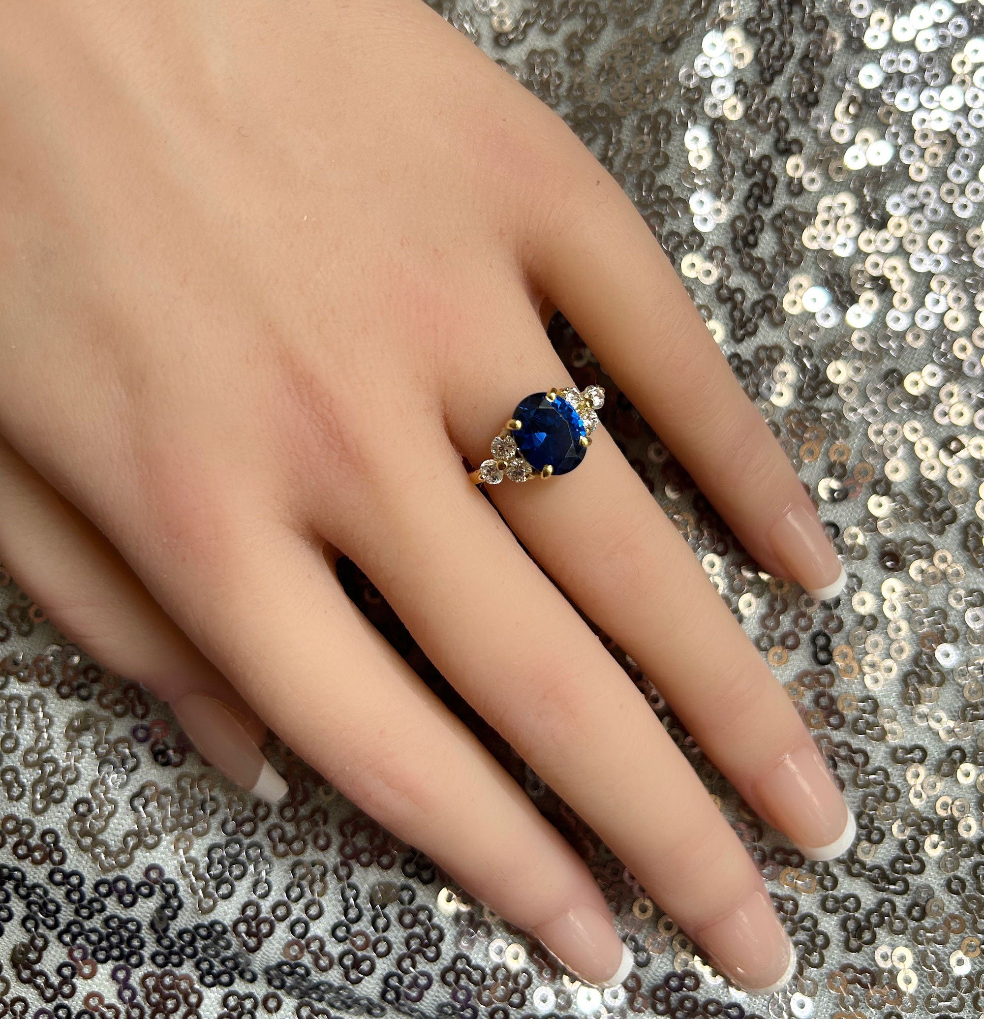 Oval Blue Sapphire Engagement Ring with Clear Quartz Accents - H.L.Jewelry