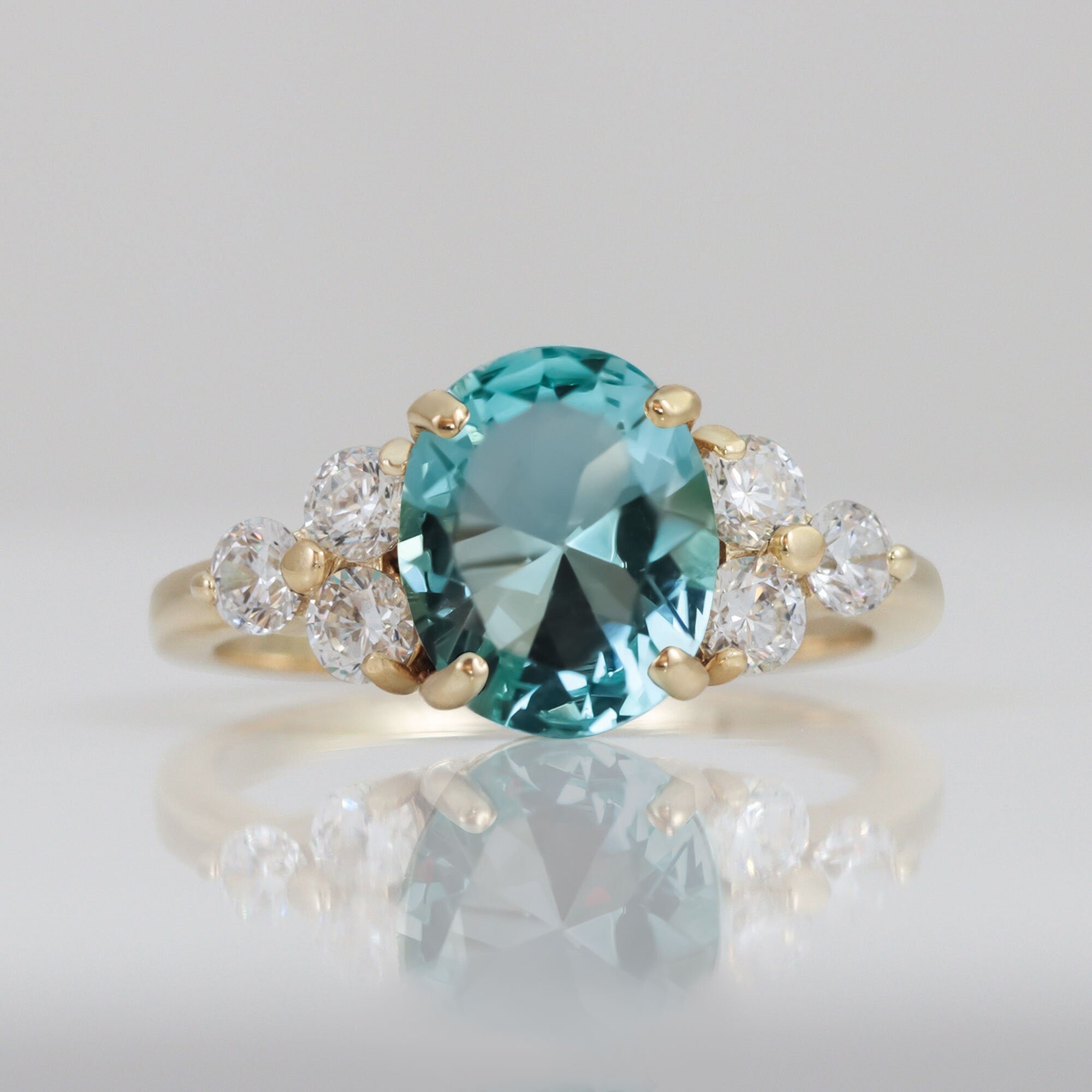 Oval Blue Topaz Engagement Ring with Clear Quartz Accents - H.L.Jewelry