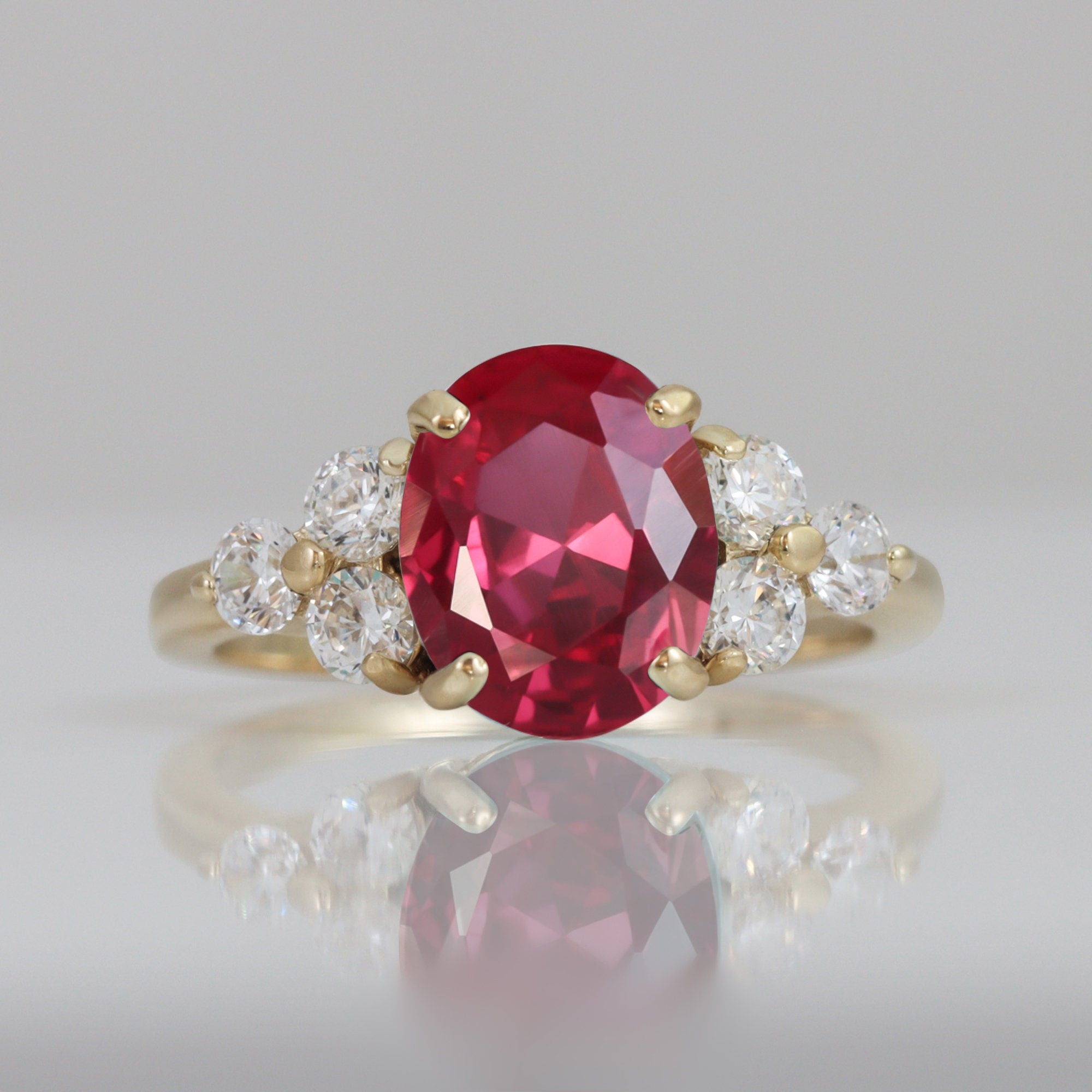 Oval Ruby Engagement Ring with Clear Quartz Trio Accents - H.L.Jewelry