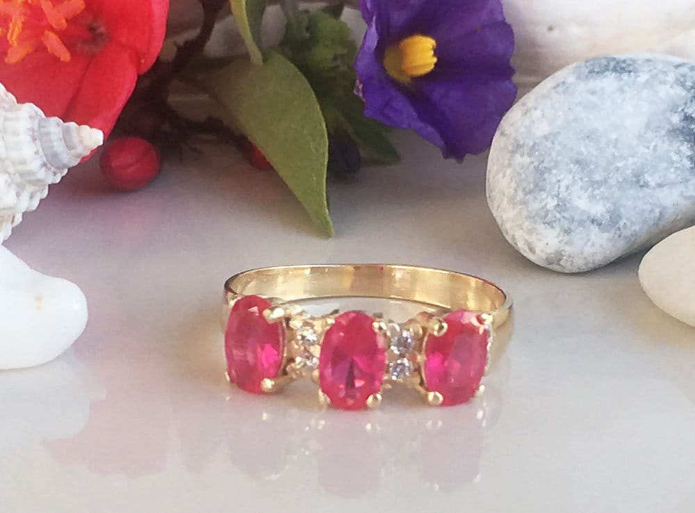 Oval Ruby Three-Stone Ring with Clear Quartz Accents - H.L.Jewelry