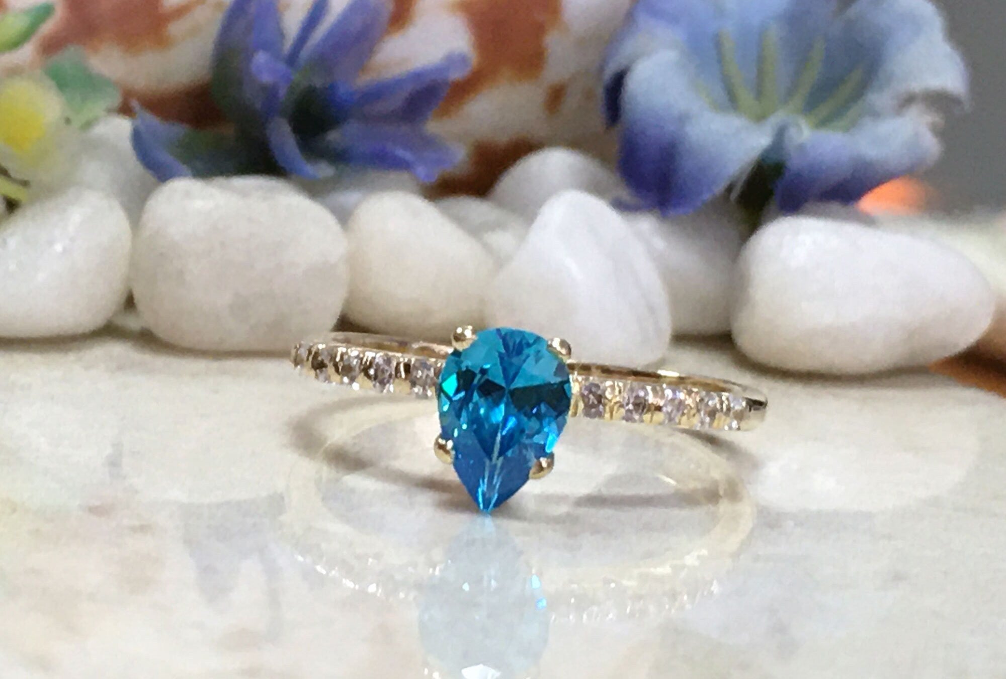 Pear-Shaped Blue Topaz Delicate Ring with Clear Quartz Accents - H.L.Jewelry