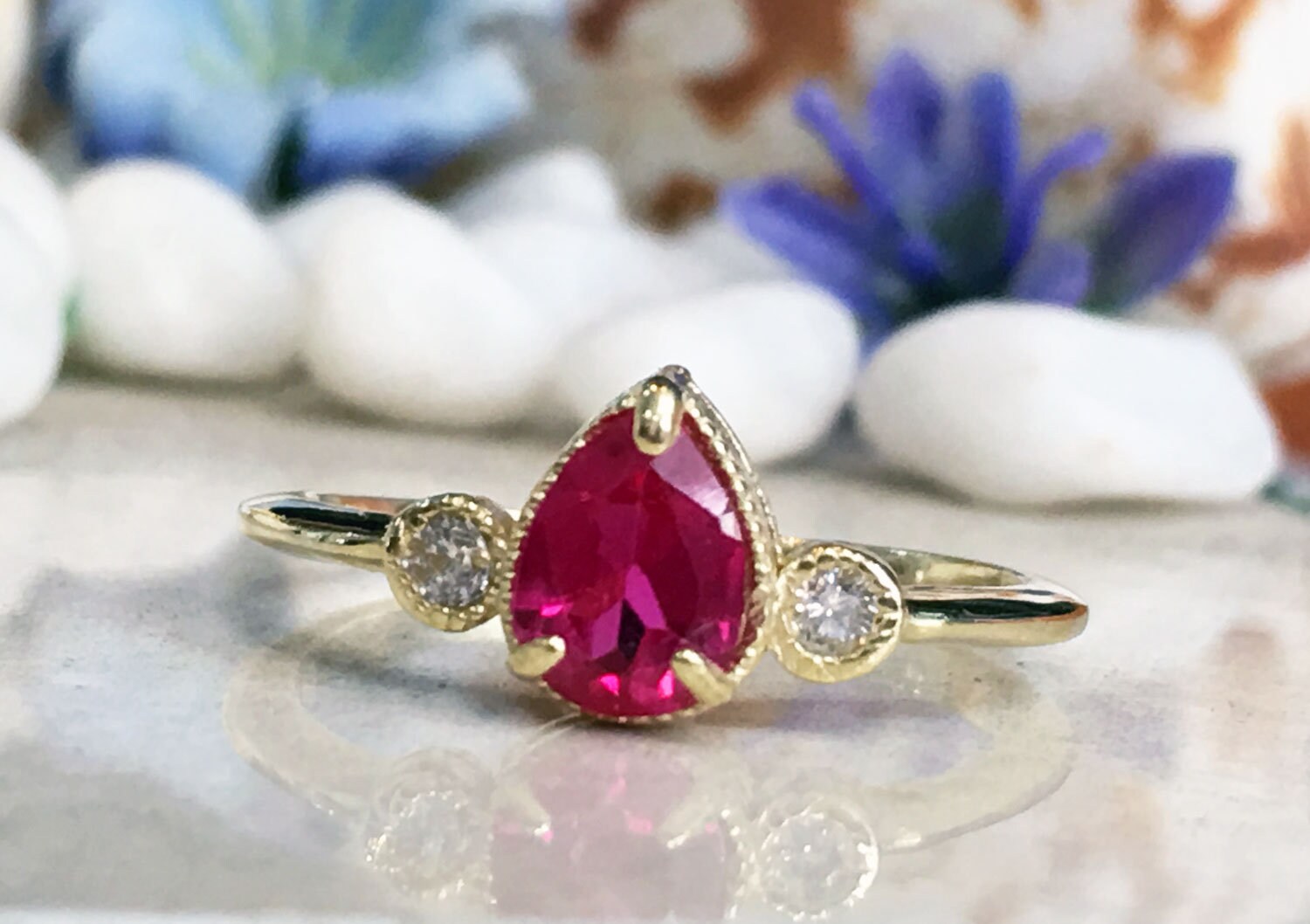 Pear-Shaped Ruby Bezel Ring with Clear Quartz Accents - H.L.Jewelry