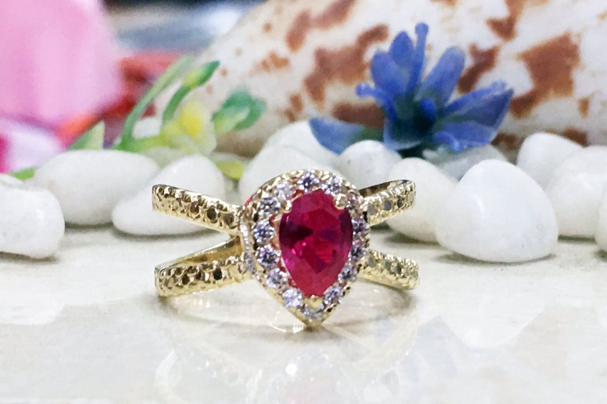 Pear-Shaped Ruby Crossover Ring with Clear Quartz Halo - H.L.Jewelry