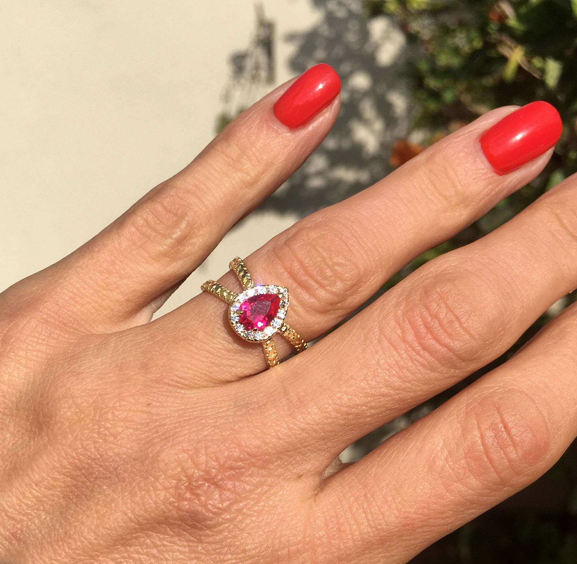 Pear-Shaped Ruby Crossover Ring with Clear Quartz Halo - H.L.Jewelry