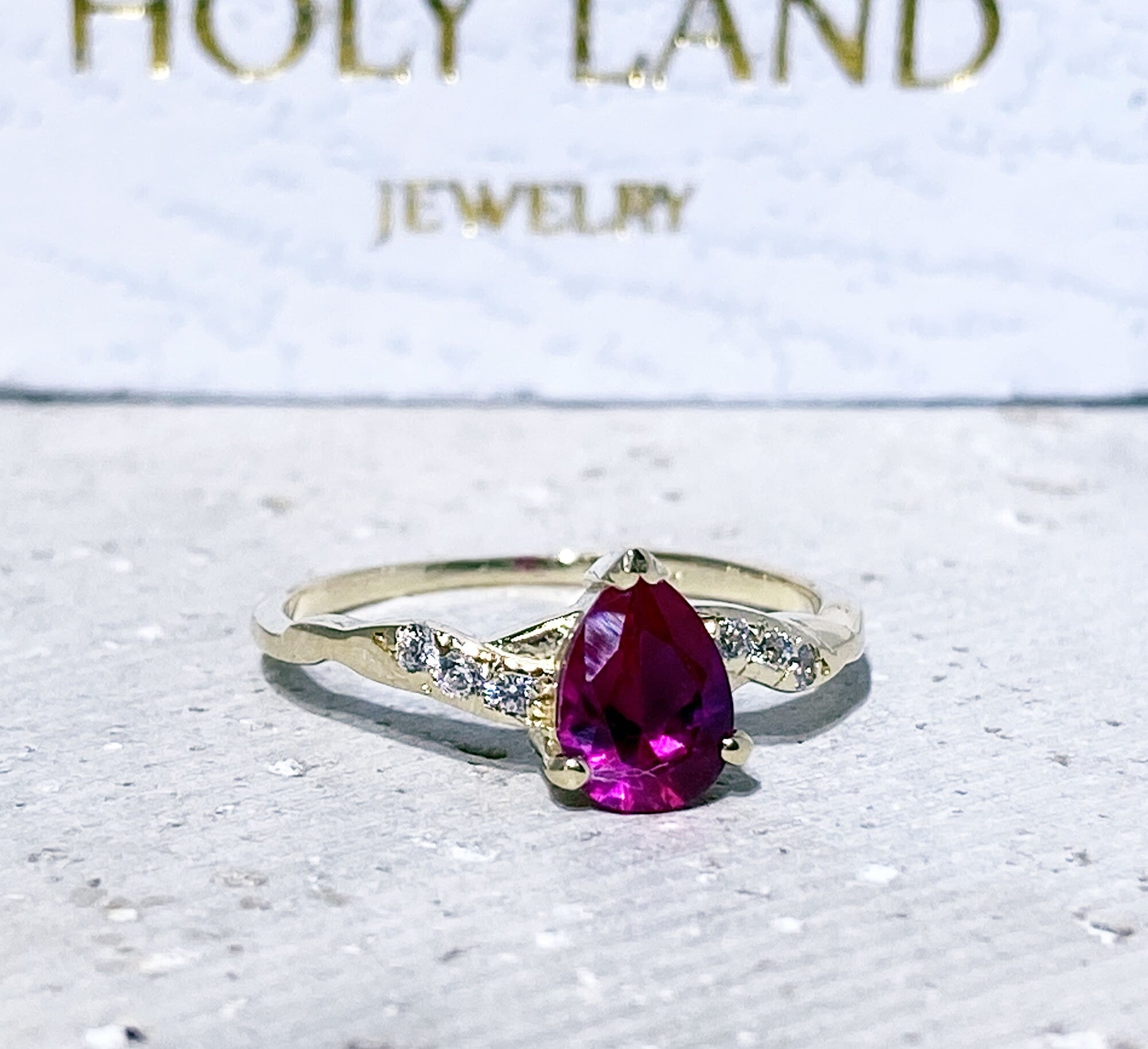Pear-Shaped Ruby Delicate Ring with Clear Quartz Accents - H.L.Jewelry