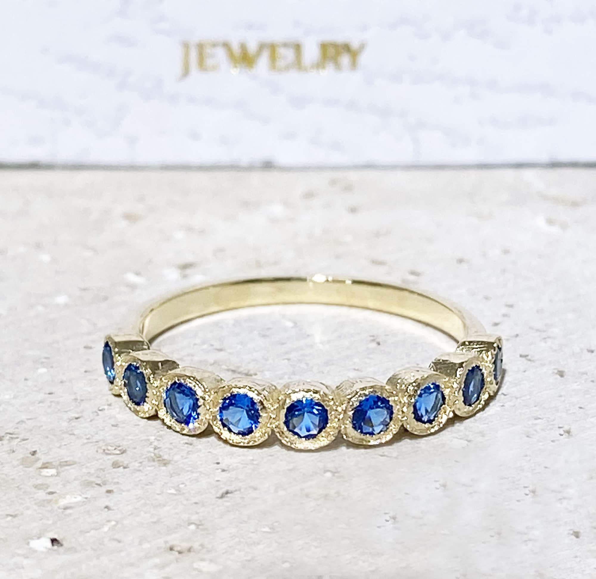 Round Blue Topaz Nine Stone Stacking Half Eternity Bezel Ring - H.L.Jewelry