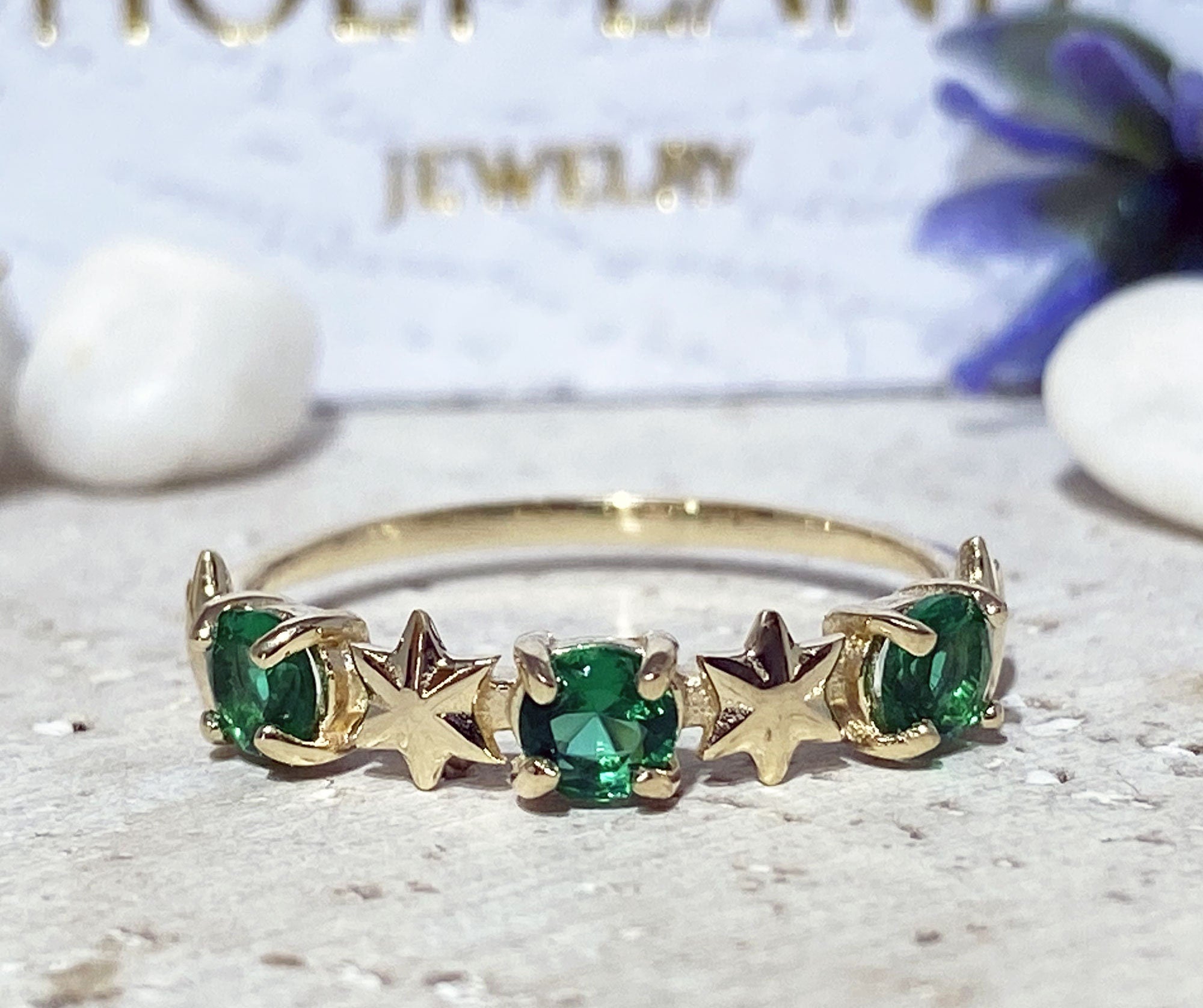 Round Emerald Three Stone Ring with Star Accents - H.L.Jewelry