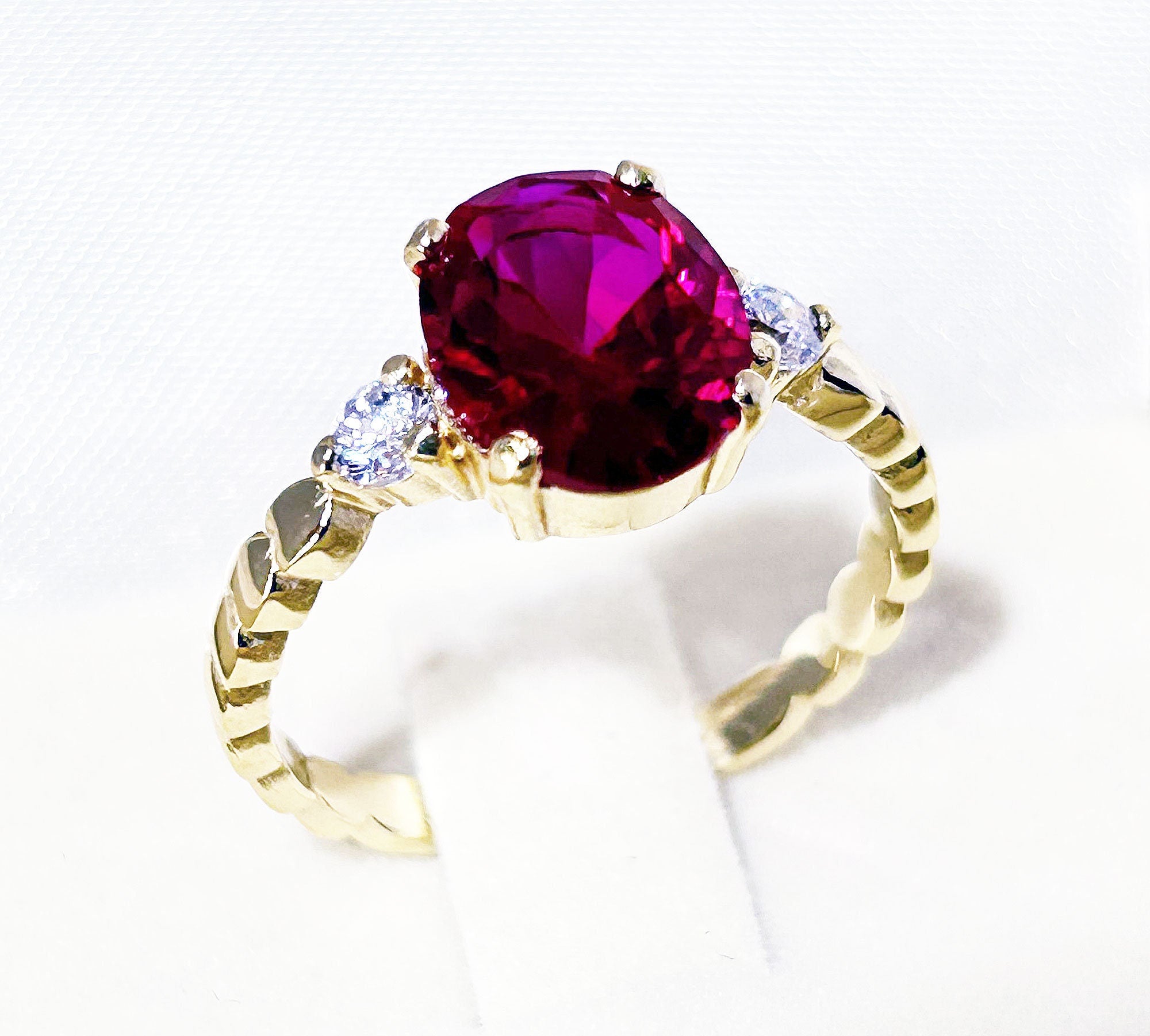 Oval Ruby Ring with Clear Quartz Accents - H.L.Jewelry