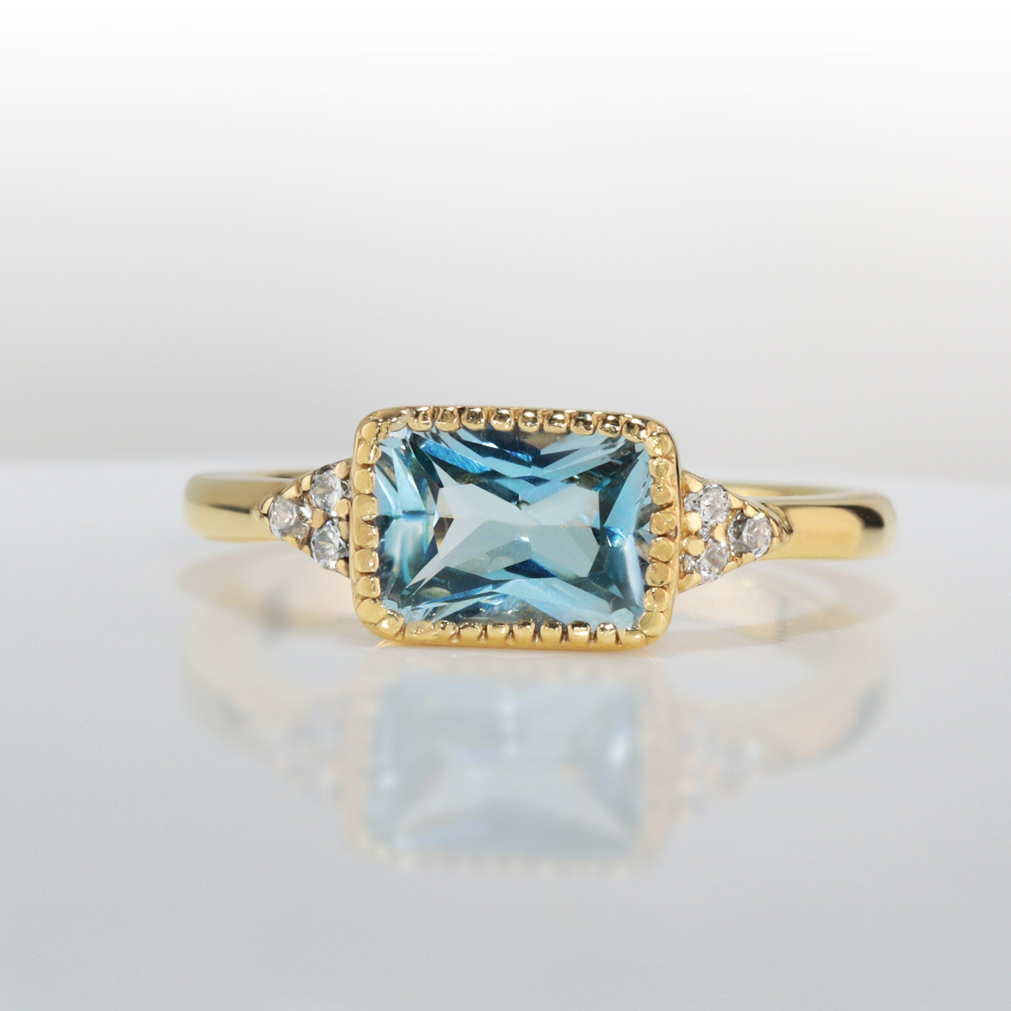 East-West Octagon Blue Topaz Ring with Clear Quartz Accents - H.L.Jewelry