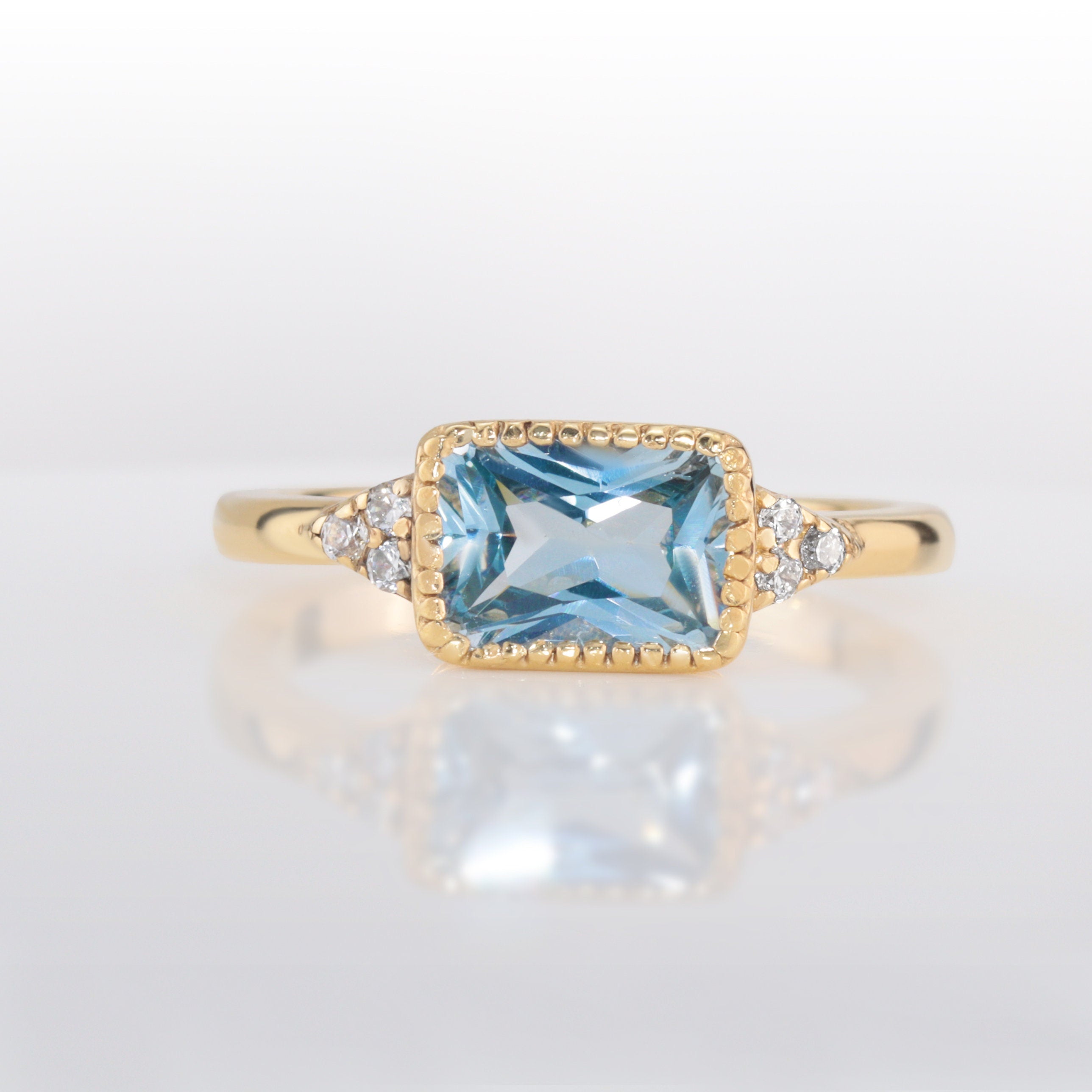 East-West Octagon Blue Topaz Ring with Clear Quartz Accents - H.L.Jewelry