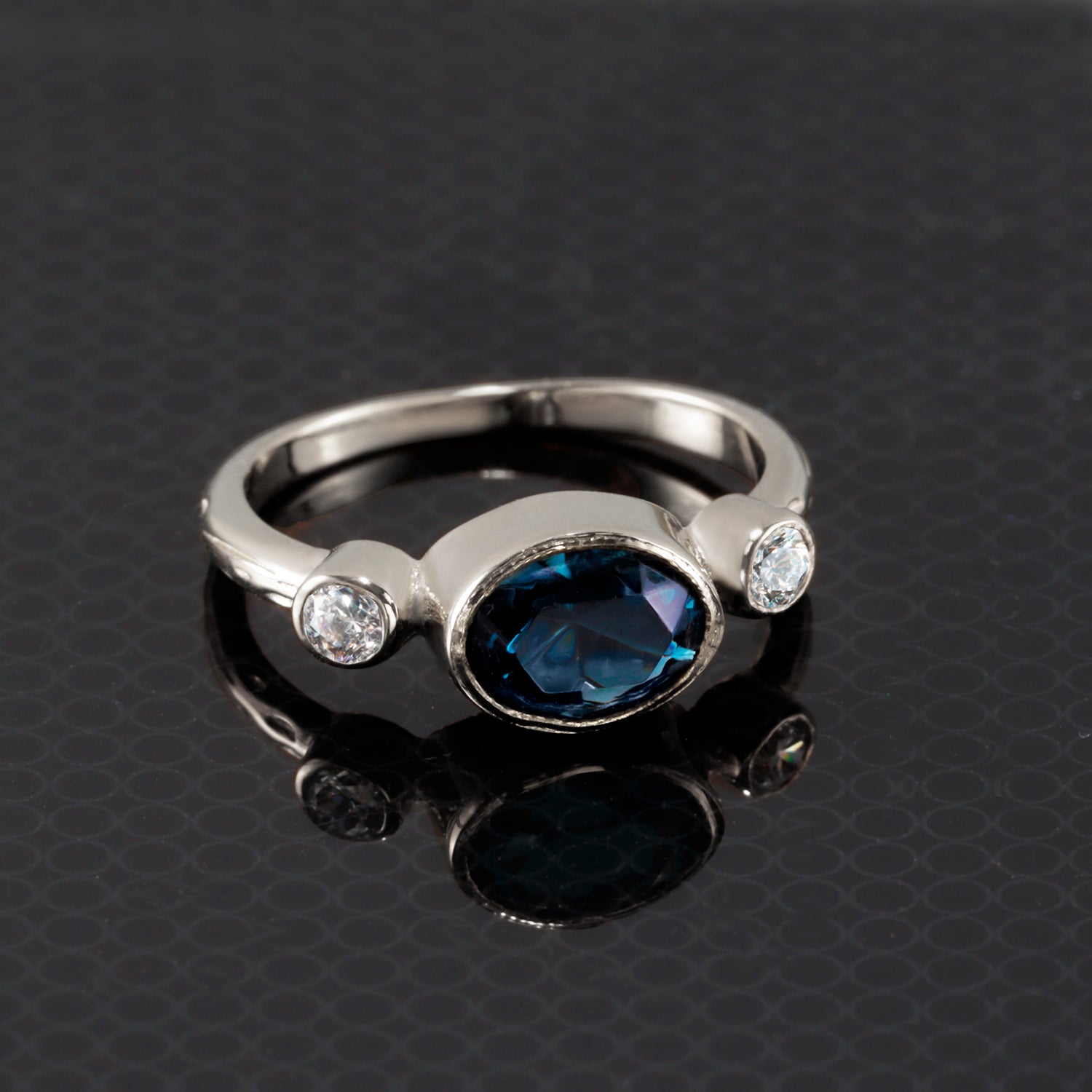 East-West Oval Blue Sapphire Bezel Ring with Clear Quartz Accents - H.L.Jewelry