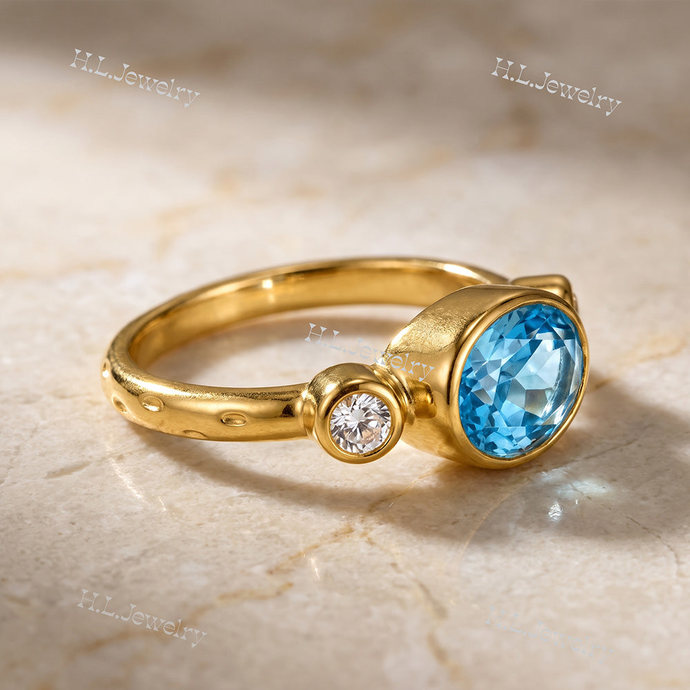 Oval Blue Topaz Bezel-Set Ring with Clear Quartz Accents - H.L.Jewelry