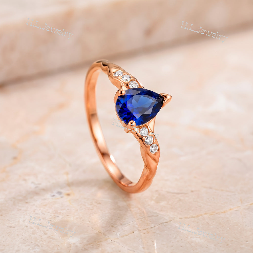 Pear-Shaped Blue Sapphire Delicate Ring with Clear Quartz Accents - H.L.Jewelry