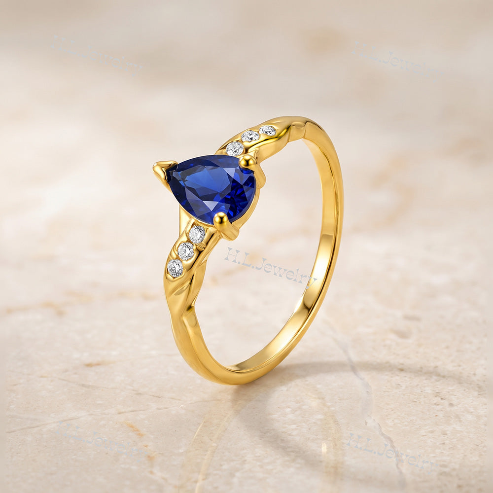 Pear-Shaped Blue Sapphire Delicate Ring with Clear Quartz Accents - H.L.Jewelry