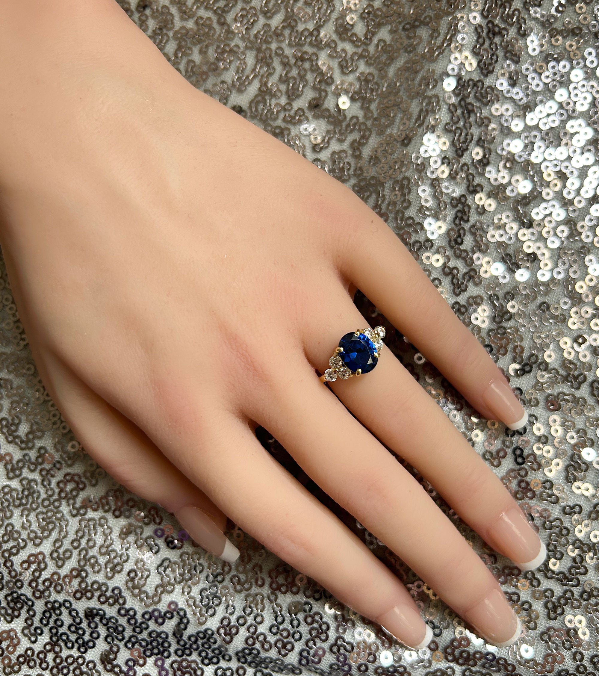 Blue Sapphire Ring - September Birthstone - Statement Engagement Ring with Oval Blue Sapphire Gemstone and Clear Quartz Accents - H.L.Jewelry