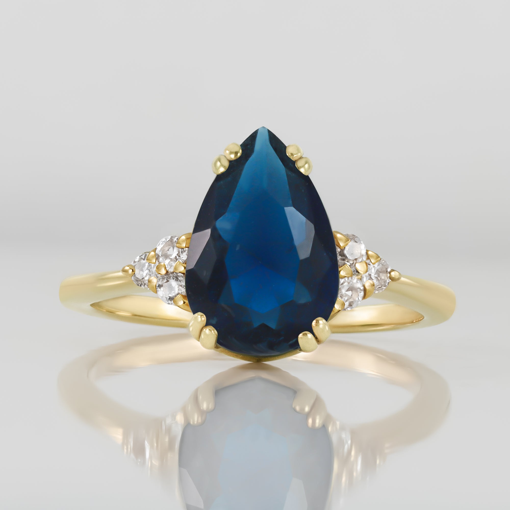 Blue Sapphire Ring - September Birthstone - Pear-Shaped Blue Sapphire Gemstone Statement Engagement Ring with Clear Quartz Accents - H.L.Jewelry