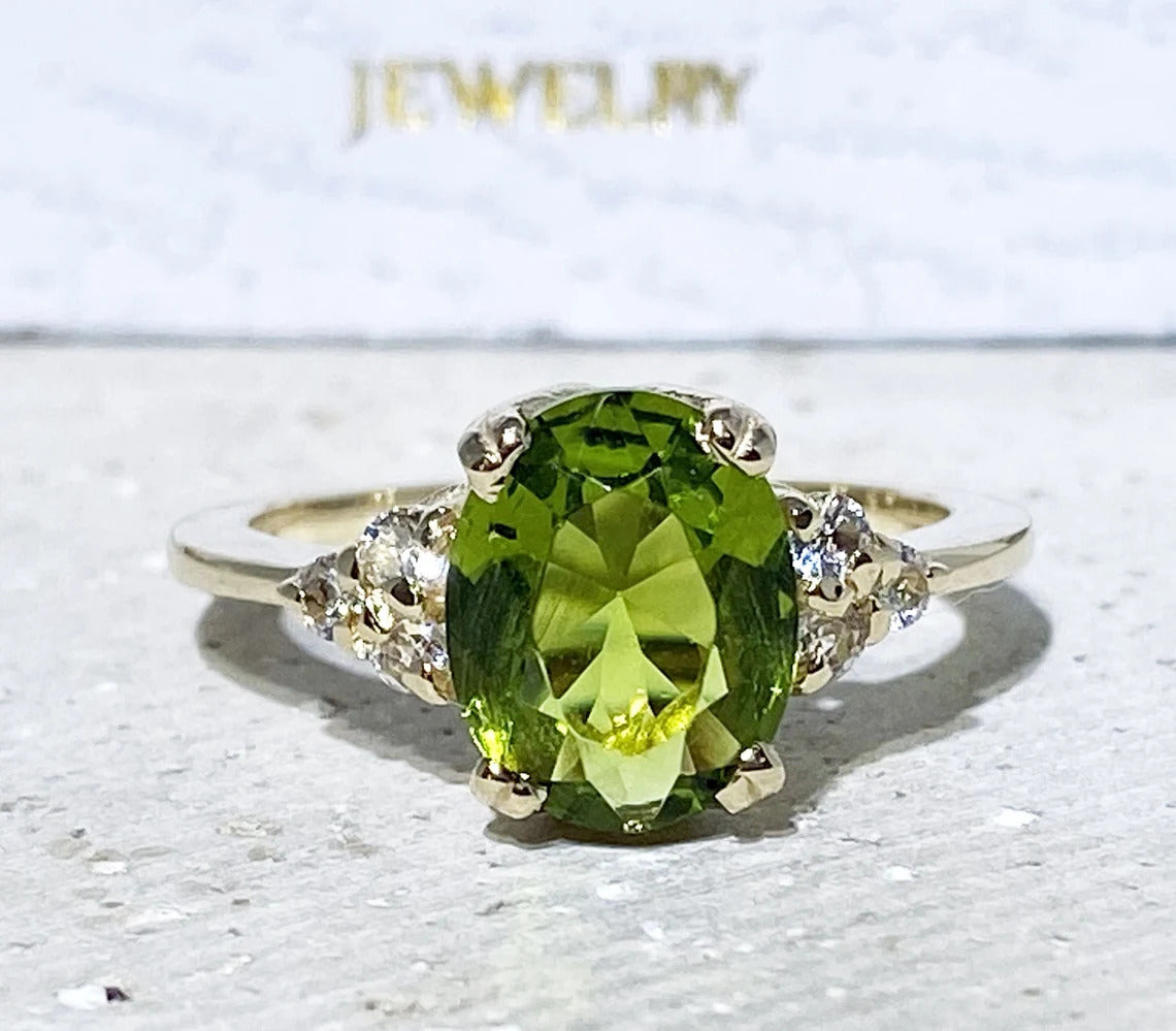 Peridot Ring - August Birthstone Jewelry - Statement Engagement Ring with Oval Peridot Gemstone and Clear Quartz Accents - H.L.Jewelry