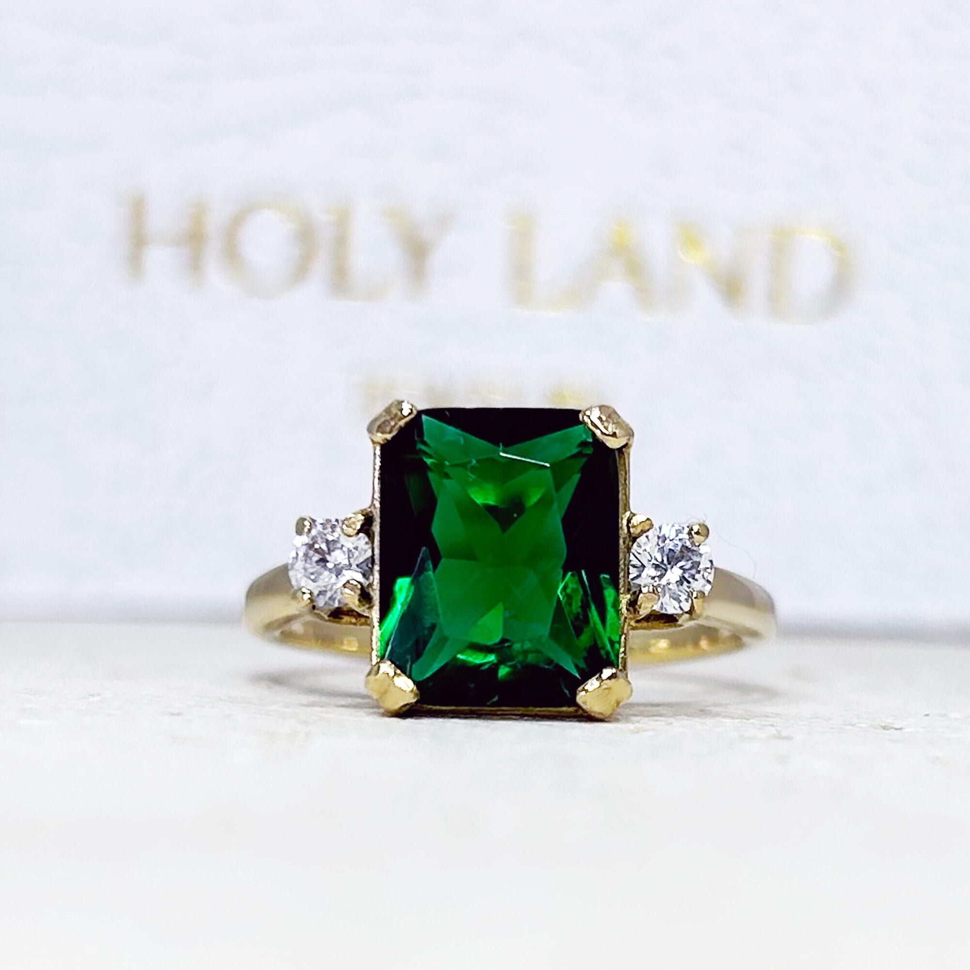 Emerald Ring - May Birthstone - Statement Engagement Ring with Octagon Emerald Gemstone and Clear Quartz Accents - H.L.Jewelry