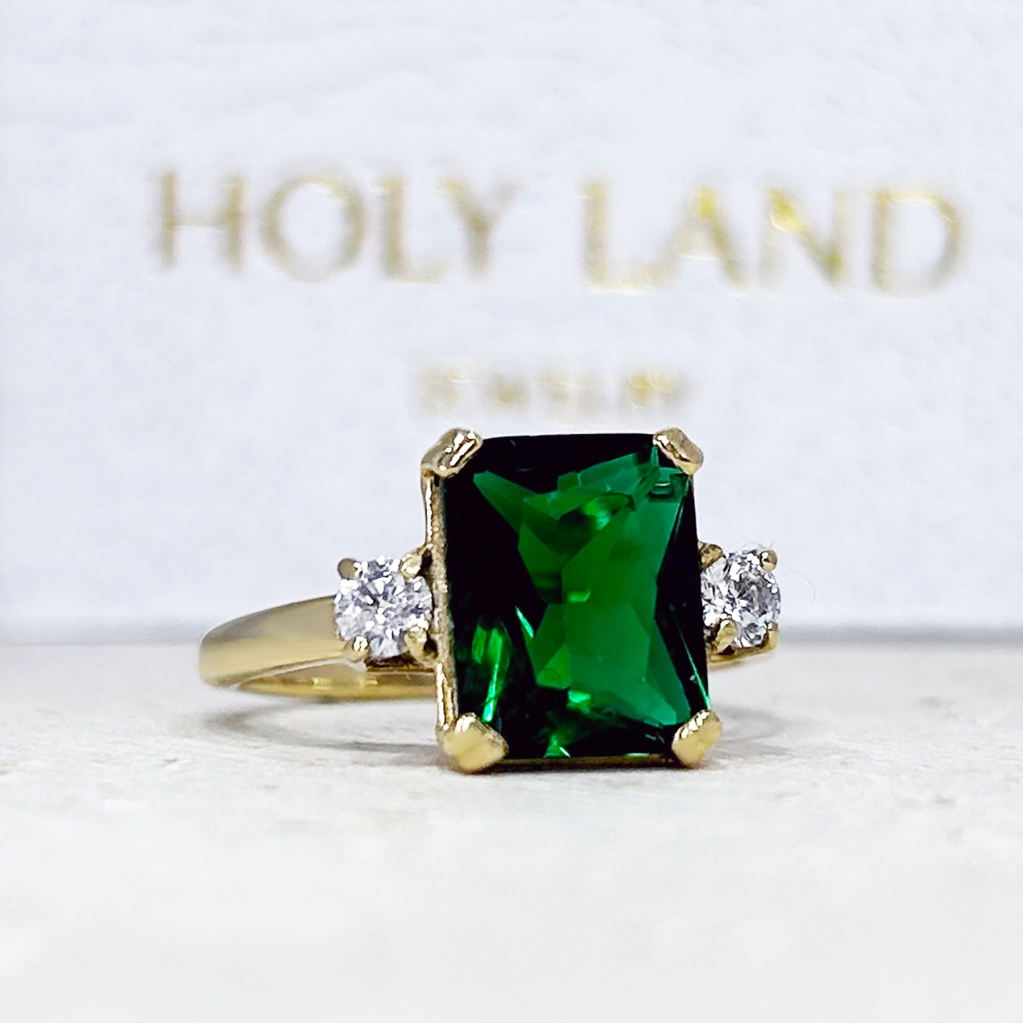 Emerald Ring - May Birthstone - Statement Engagement Ring with Octagon Emerald Gemstone and Clear Quartz Accents - H.L.Jewelry