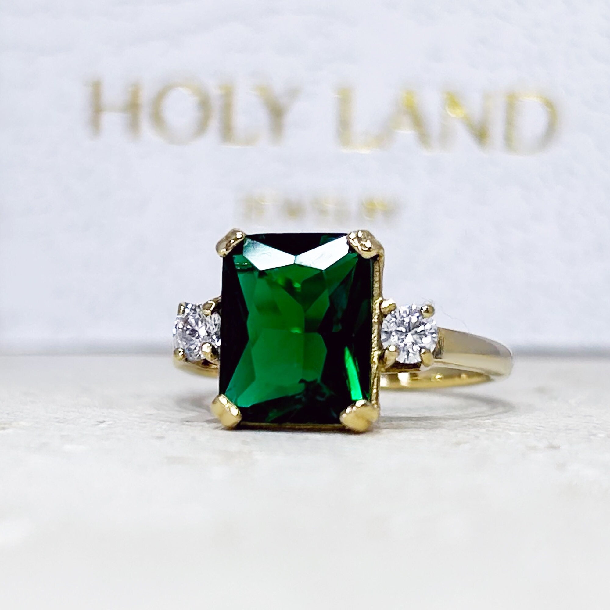 Emerald Ring - May Birthstone - Statement Engagement Ring with Octagon Emerald Gemstone and Clear Quartz Accents - H.L.Jewelry