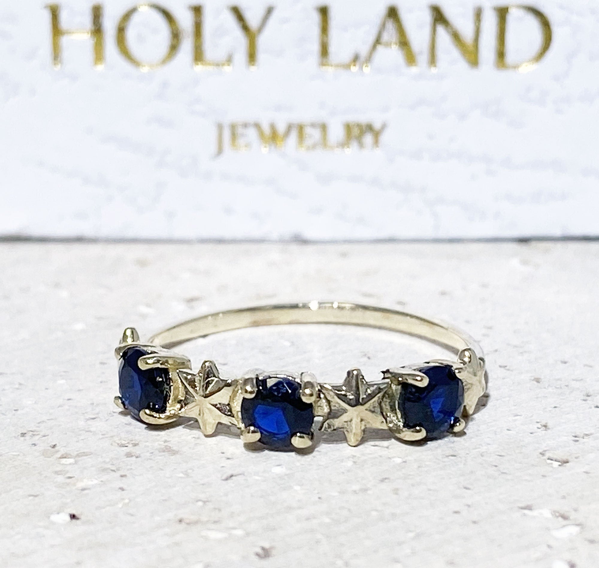 Blue Sapphire Three Stone Ring with Star Accents - H.L.Jewelry