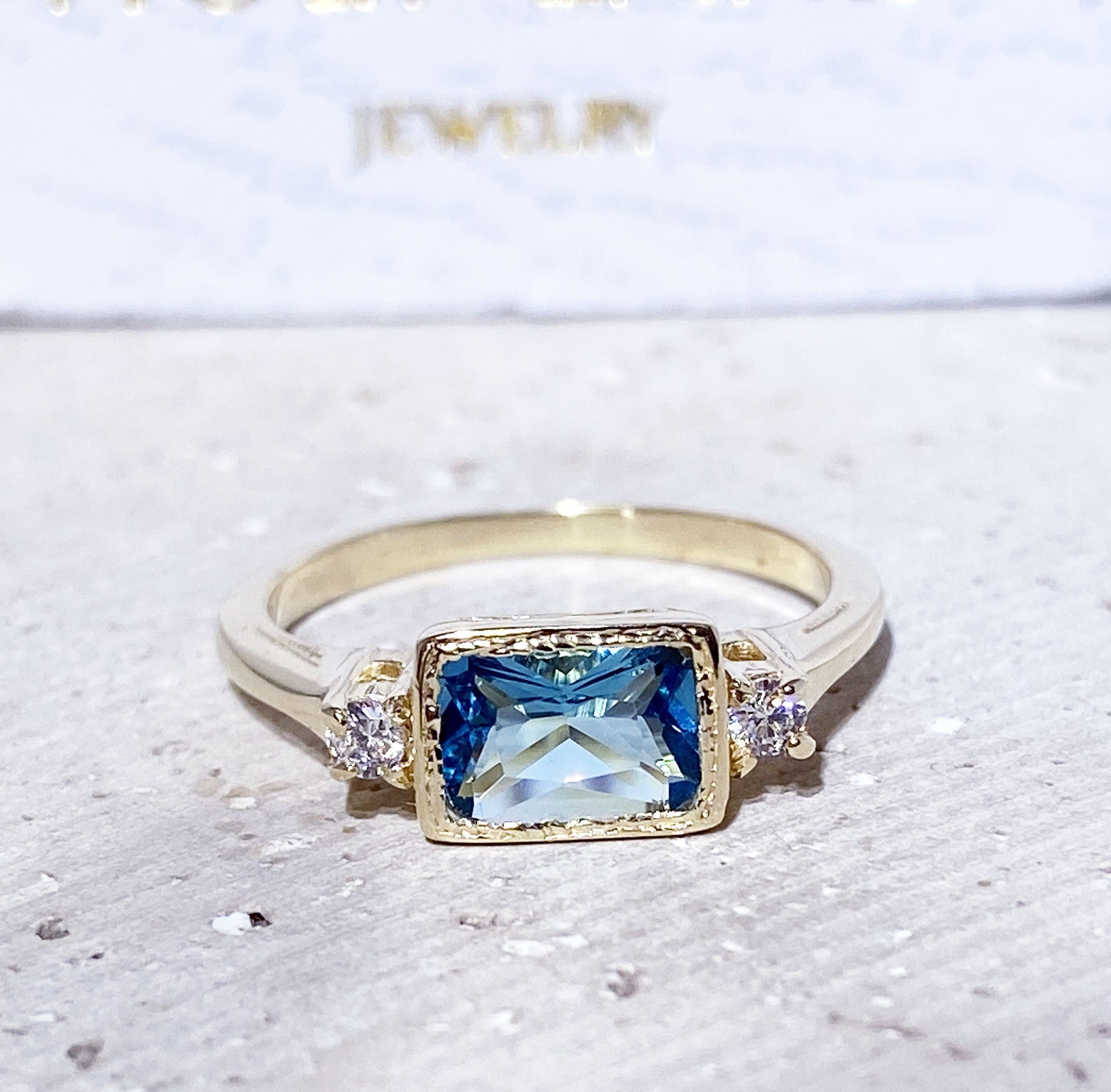 East-West Octagon Blue Topaz Simple Ring with Clear Quartz Accents - H.L.Jewelry
