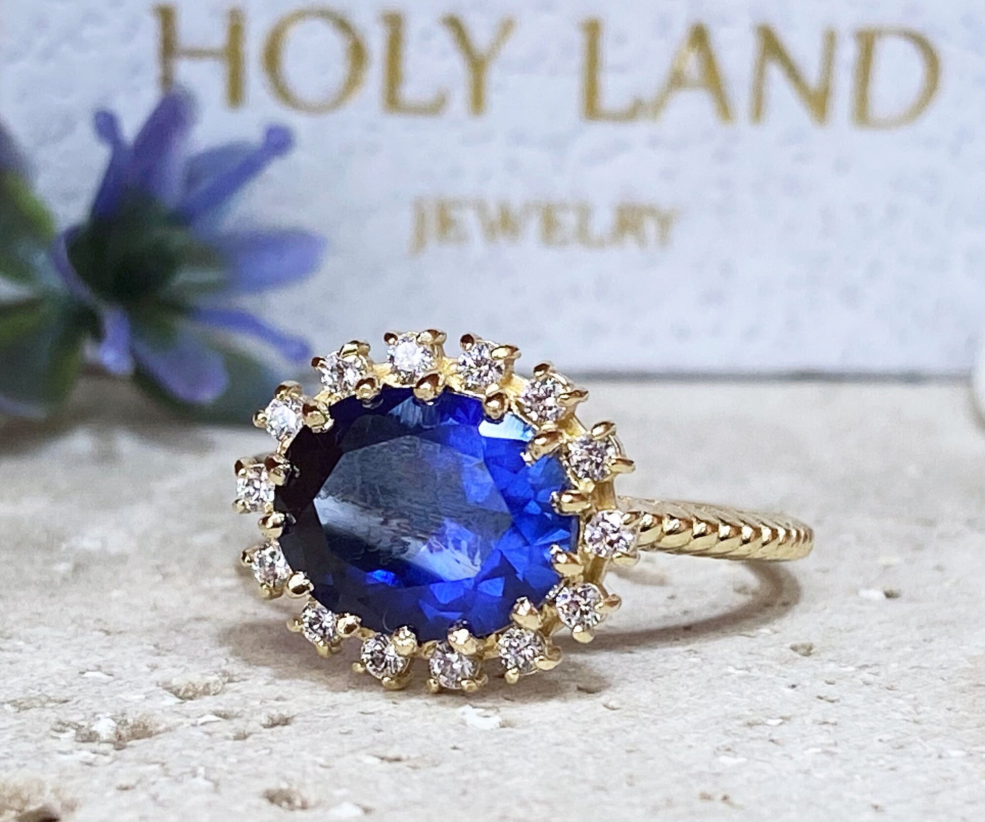 East-West Oval Blue Sapphire Ring with Clear Quartz Halo - H.L.Jewelry