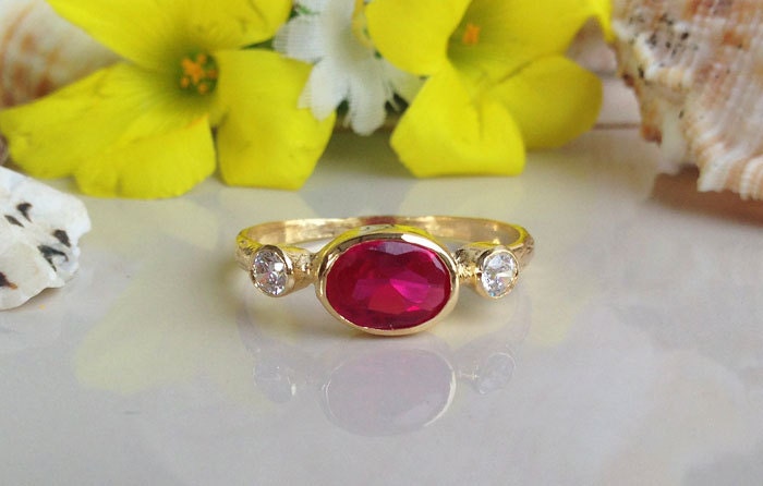 East-West Oval Ruby Bezel Ring with Clear Quartz Accents - H.L.Jewelry