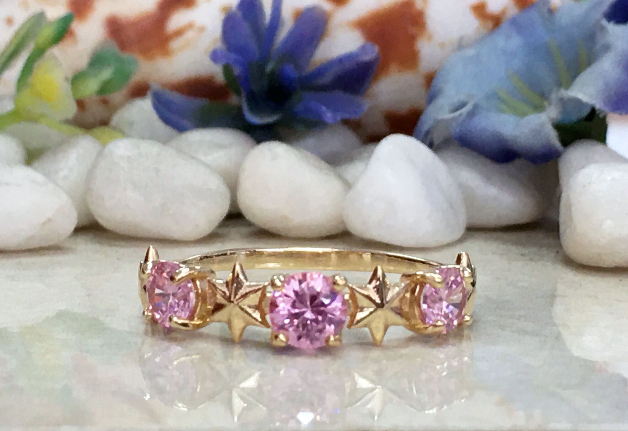 October Birthstone Round Rose Quartz Three-Stone Ring with Star Accents - H.L.Jewelry