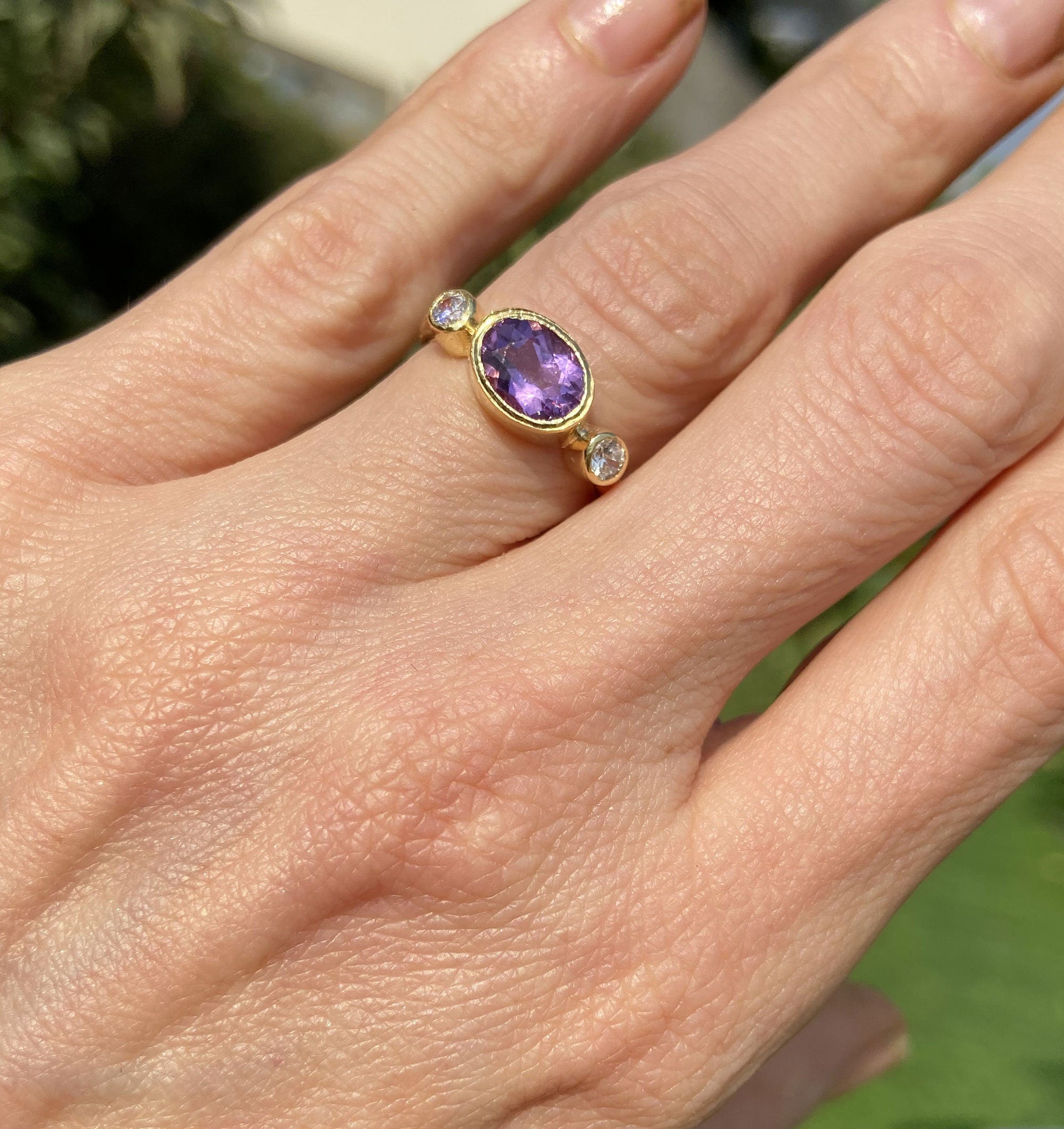 Oval Amethyst Three Stone Bezel Ring with Clear Quartz Accents - H.L.Jewelry
