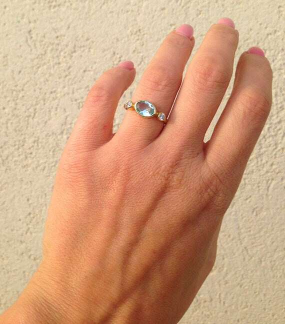 Oval Aquamarine Bezel Ring with Clear Quartz Accents - H.L.Jewelry