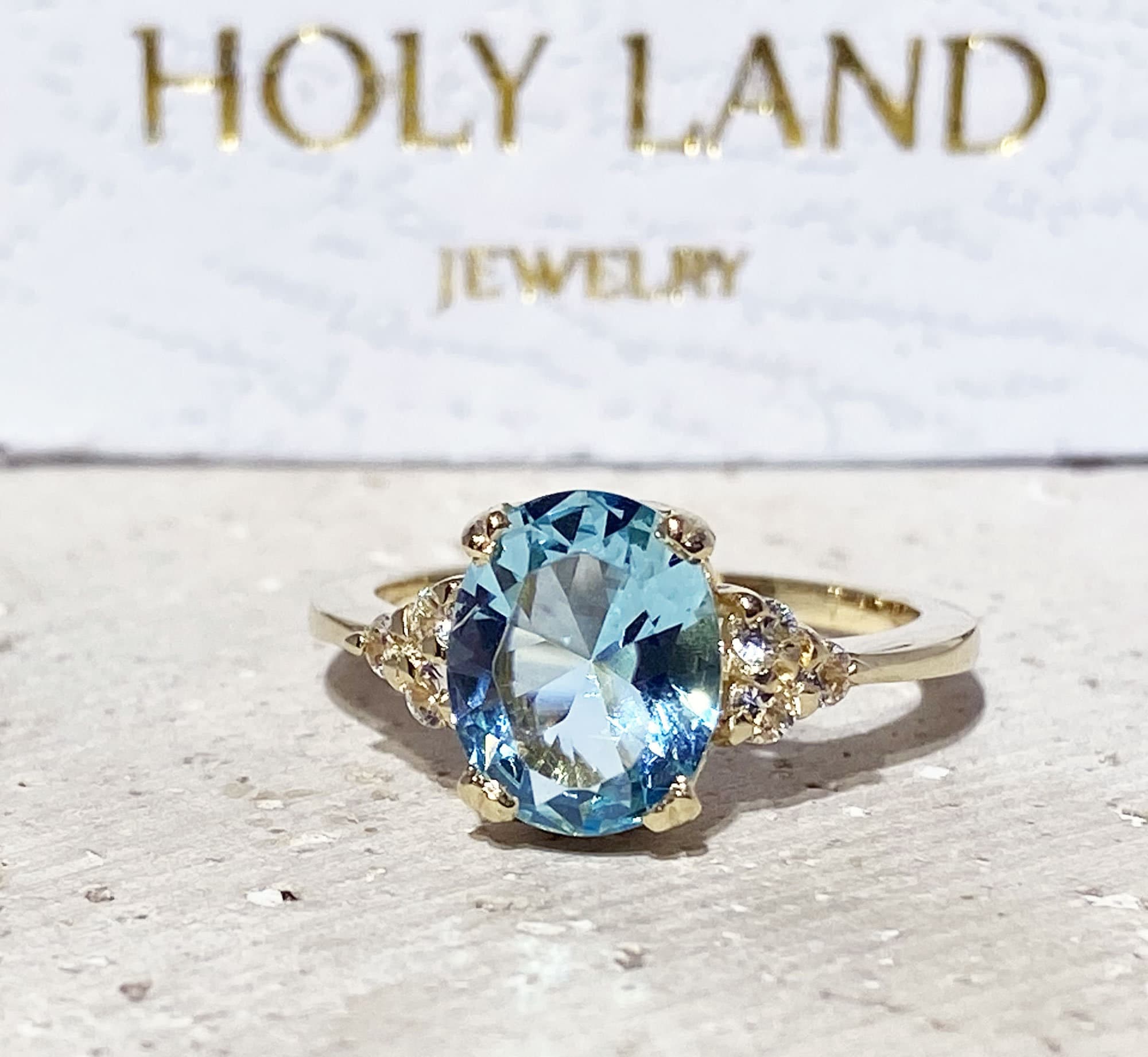 Oval Aquamarine Engagement Ring with Clear Quartz Accents - H.L.Jewelry