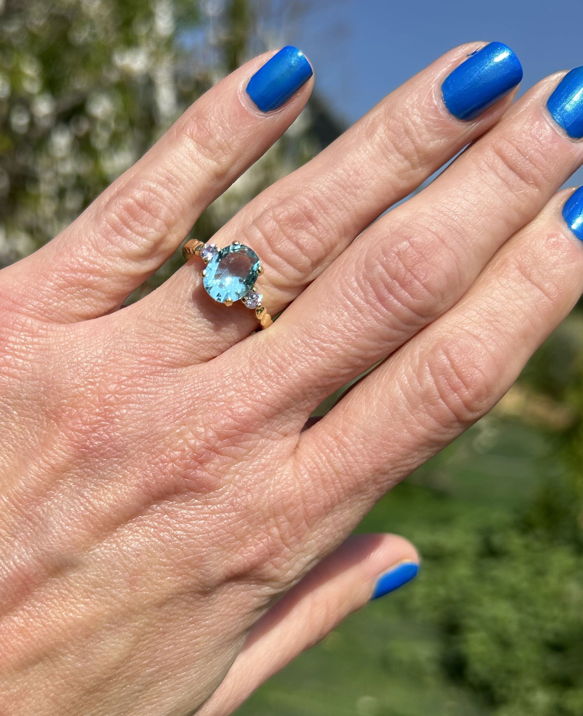 Oval Aquamarine Gemstone Ring with Clear Quartz Accents - H.L.Jewelry