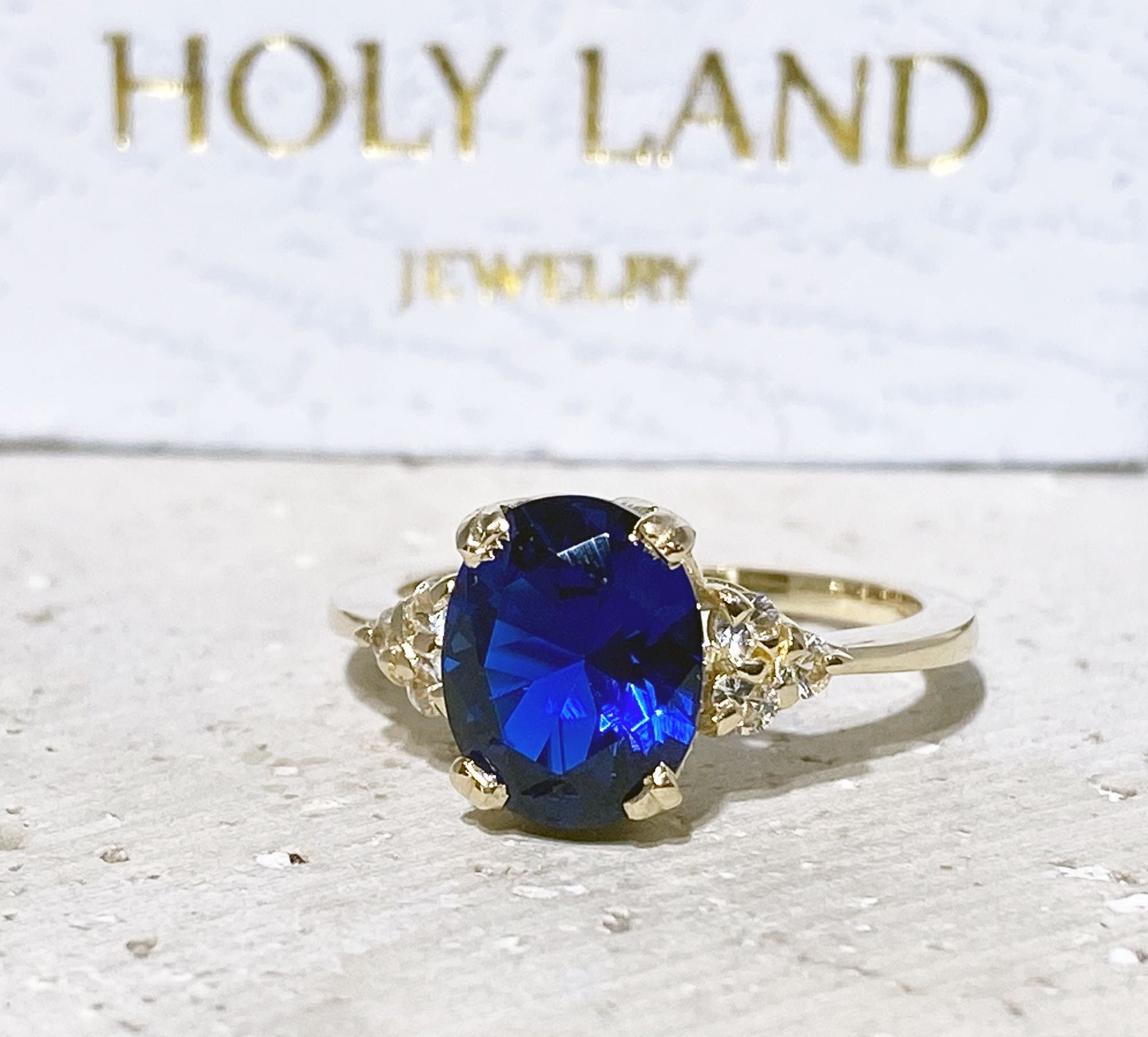Oval Blue Sapphire Engagement Ring with Clear Quartz Accents - H.L.Jewelry