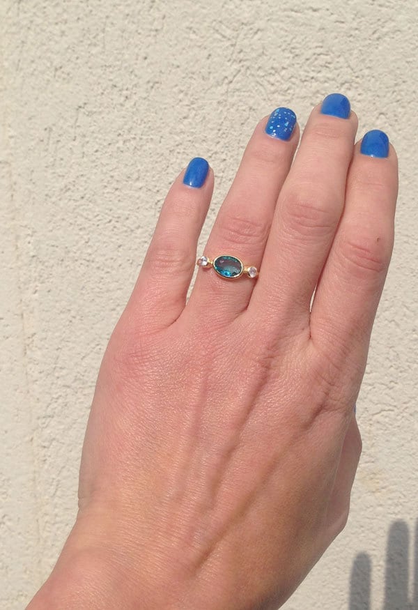 Oval Blue Topaz Bezel-Set Ring with Clear Quartz Accents - H.L.Jewelry