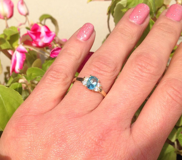 Oval Blue Topaz Simple Ring with Clear Quartz Accents - H.L.Jewelry
