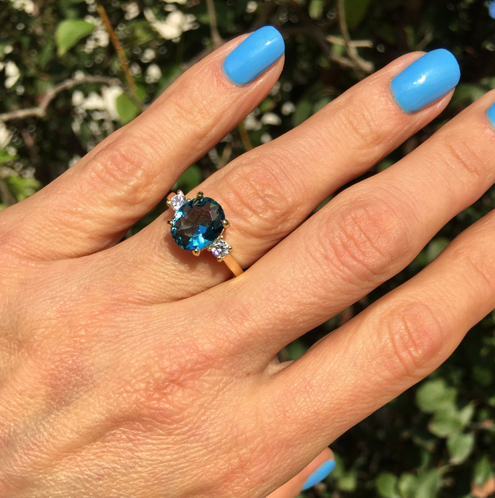 Oval Blue Topaz Statement Ring with Clear Quartz Accents - H.L.Jewelry