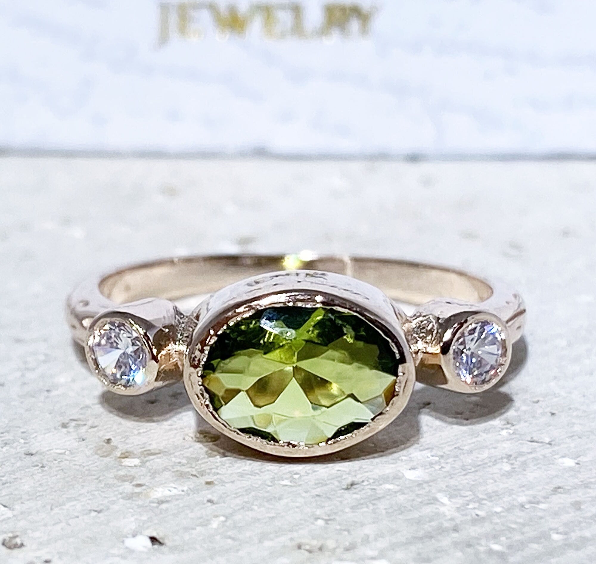 Oval Peridot Three Stone Bezel Ring with Clear Quartz Accents - H.L.Jewelry