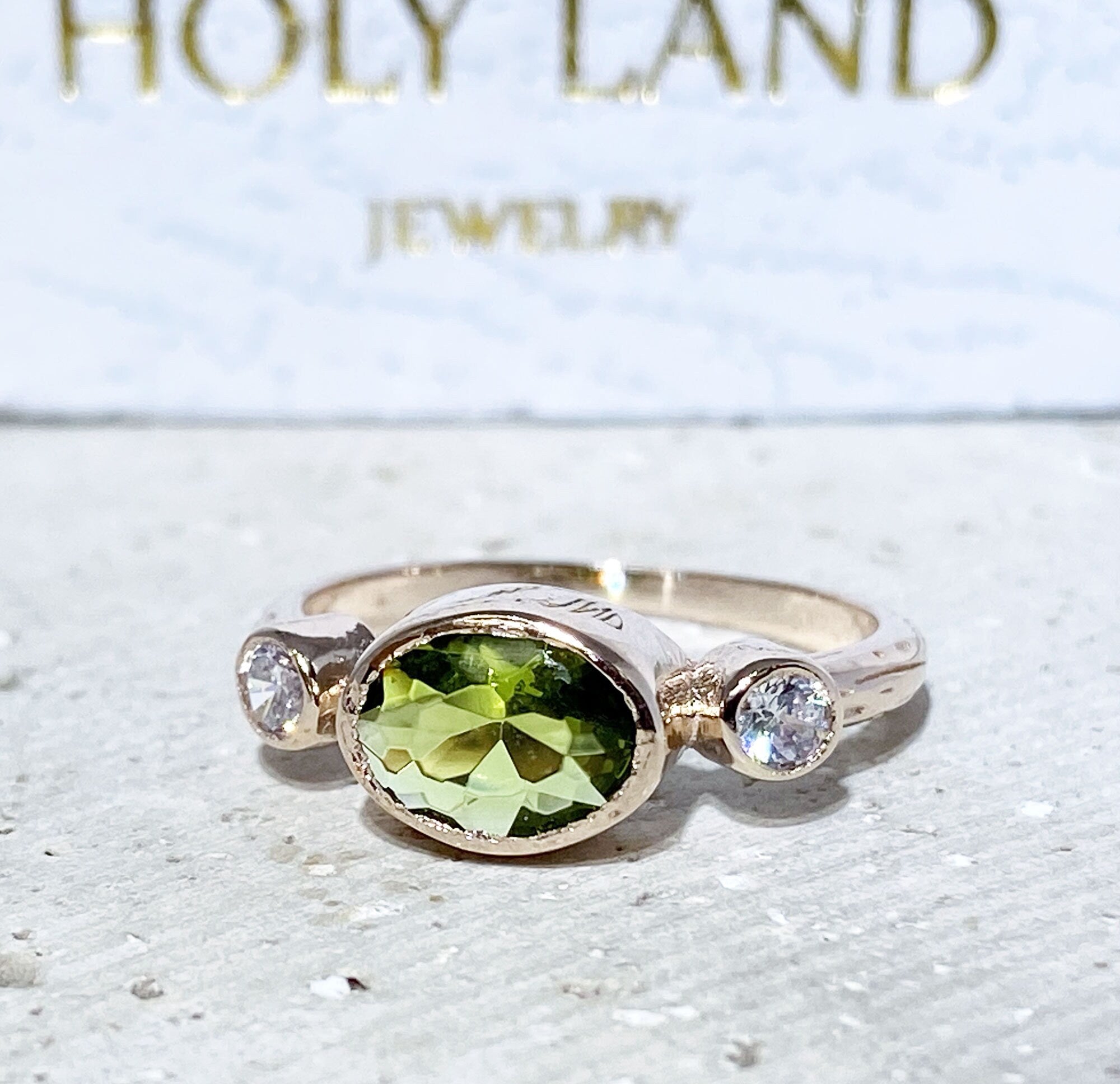 Oval Peridot Three Stone Bezel Ring with Clear Quartz Accents - H.L.Jewelry