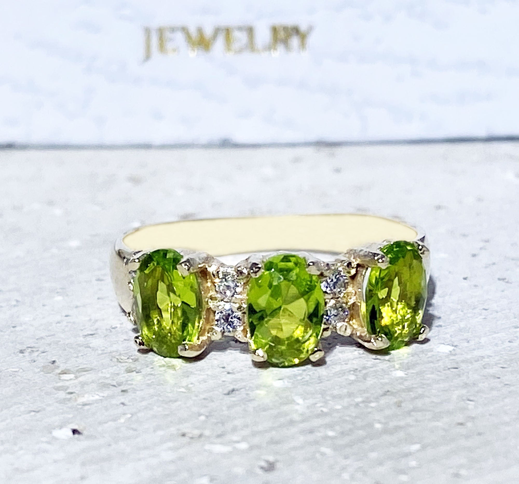 Oval Peridot Three Stone Ring with Clear Quartz Accents - H.L.Jewelry