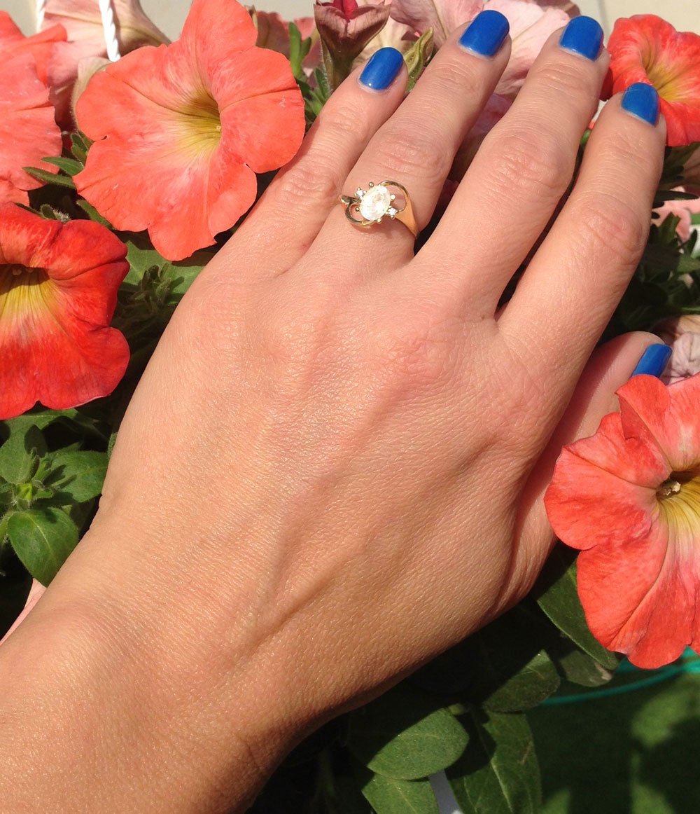 Oval Rainbow Moonstone Ring with Clear Quartz Accents - H.L.Jewelry