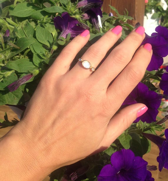 Oval Rainbow Moonstone Three Stone Bezel Ring with Clear Quartz Accents - H.L.Jewelry